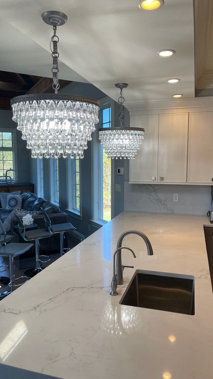 Kitchen Remodel using Fabuwood Luna Dove and Indigo Cabinetry by HomeWerkes Design & Build