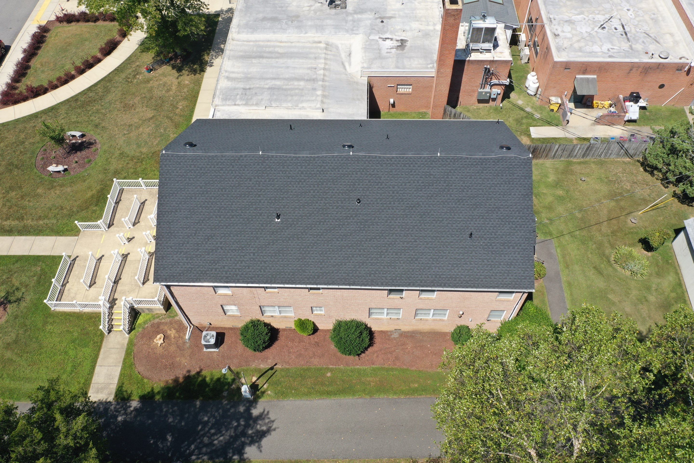 Roof Installation using Flat Roof Coating by ExteriorPros
