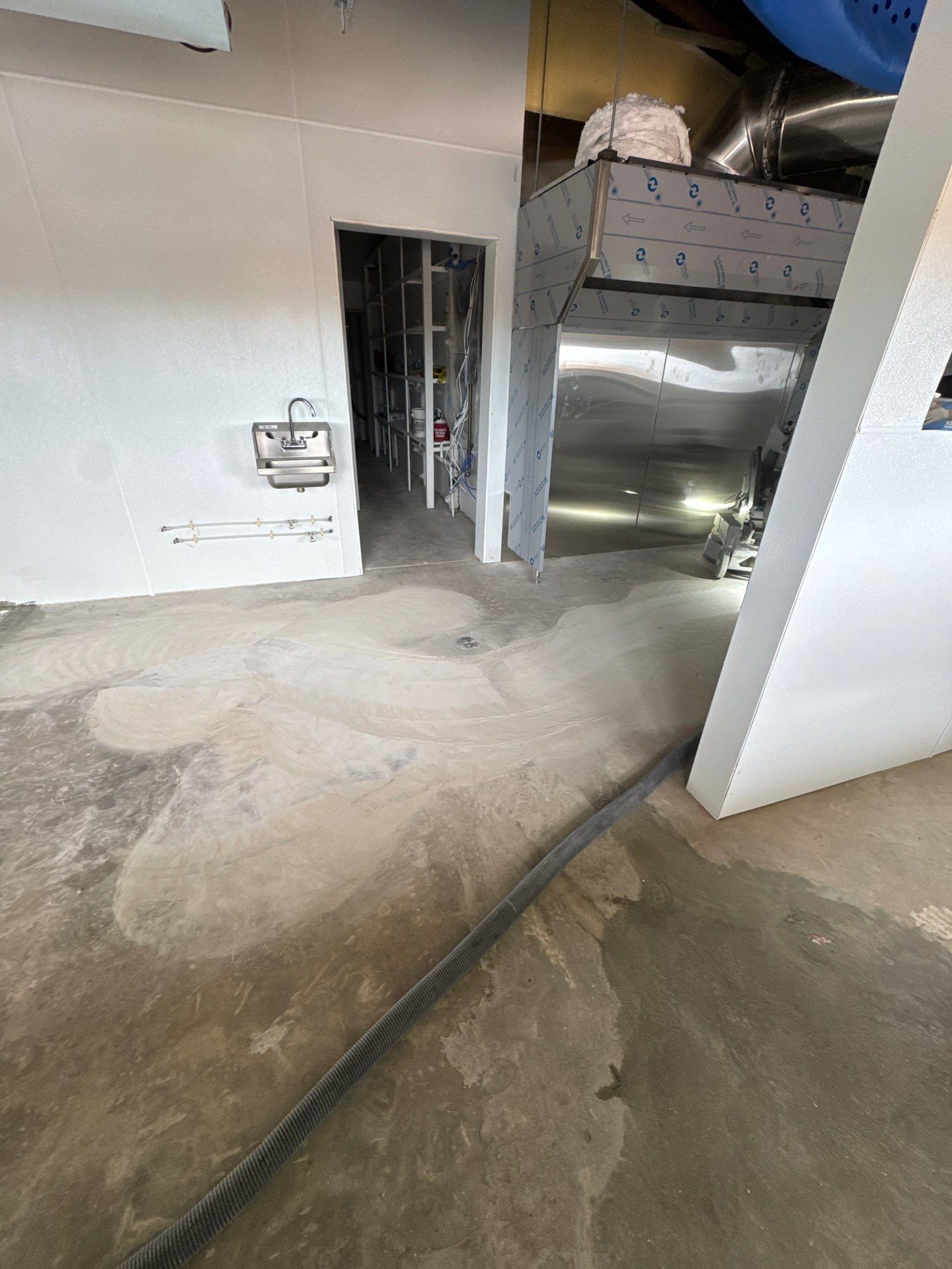 Commercial Restroom Refresh: Seamless 'Tidal Wave' Flake for a Repeat Client by Performance Floors & Coating