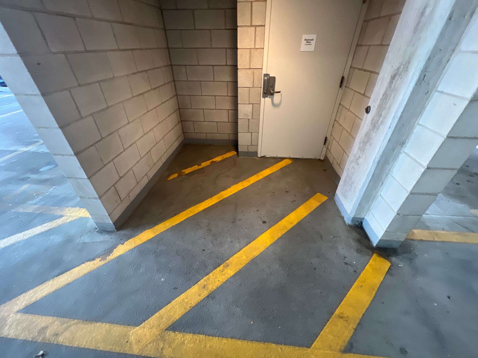 Parking garage using Hot water by Northern Power Washing LLC.