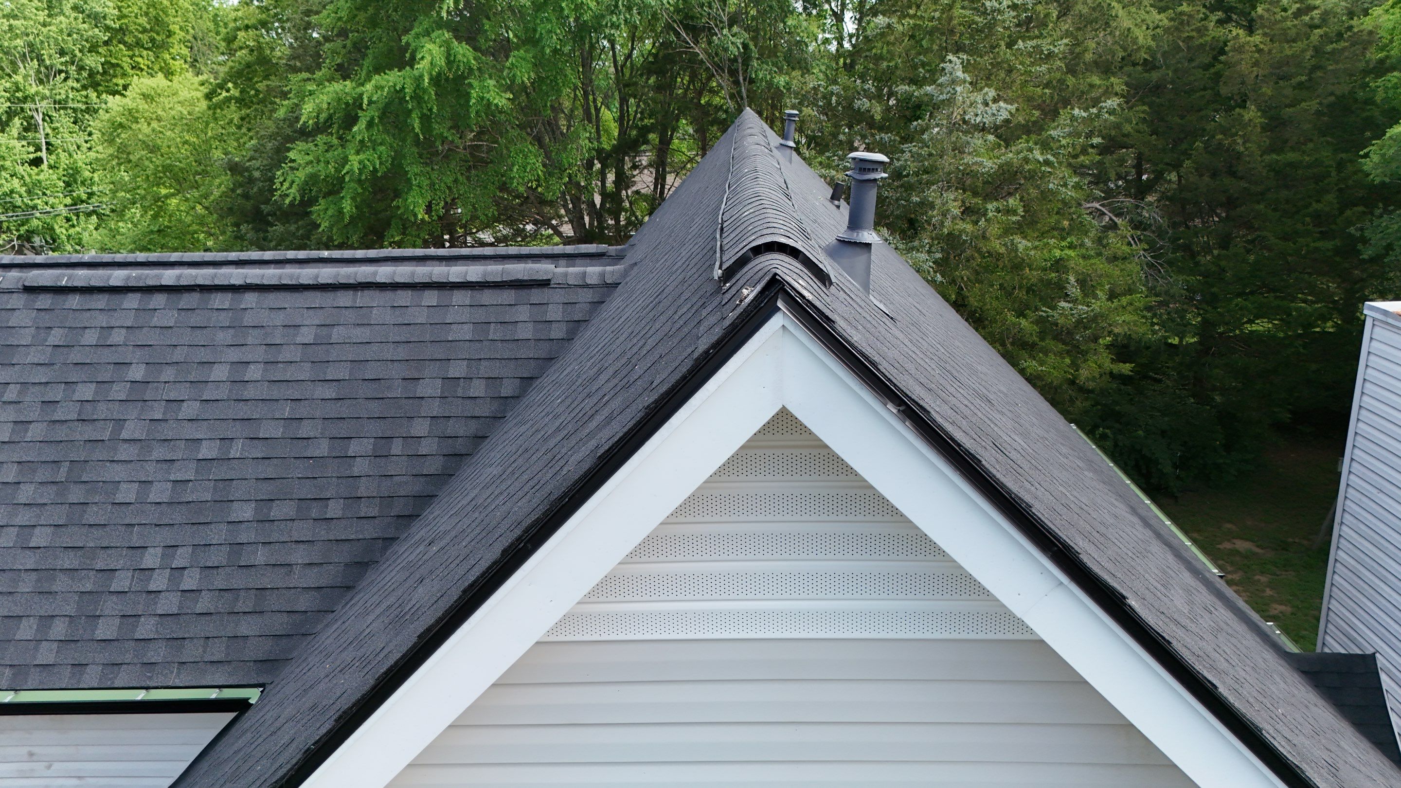 Charcoal Black Re-Roof by Royal House LLC