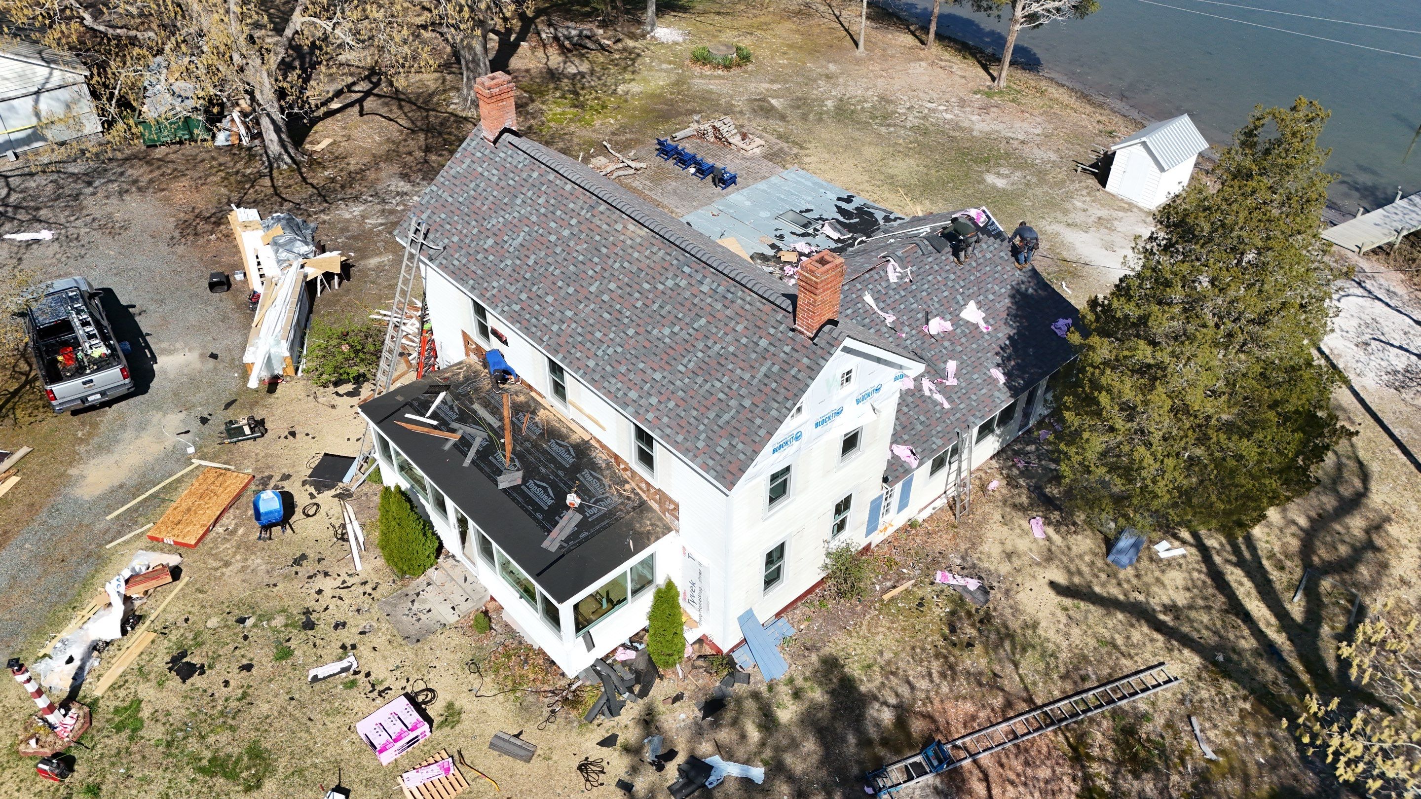 Waterfront Exterior Renovation in Port Haywood by Cade Construction