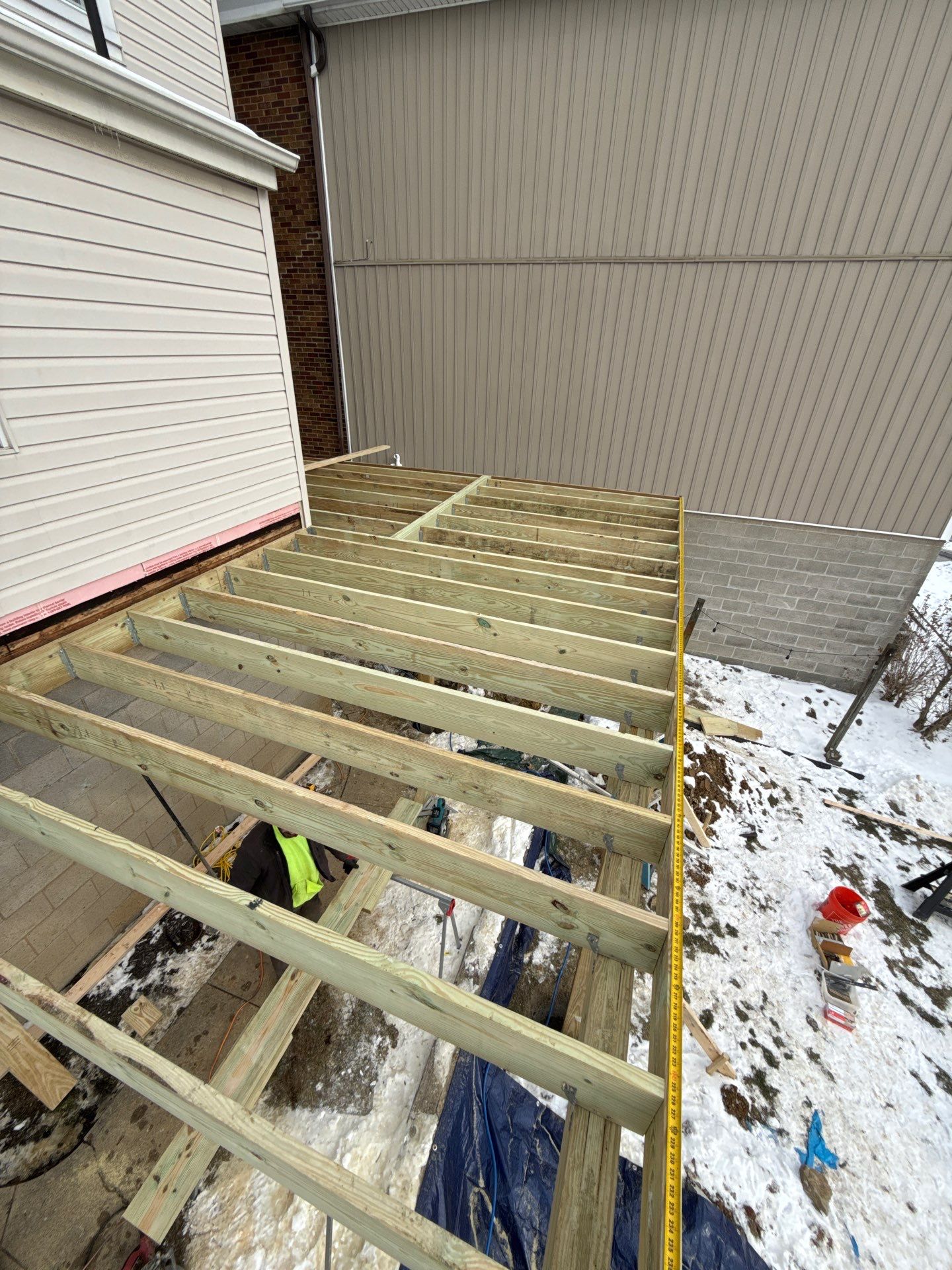 Deck and door by Cousins Roofing Siding & Decks