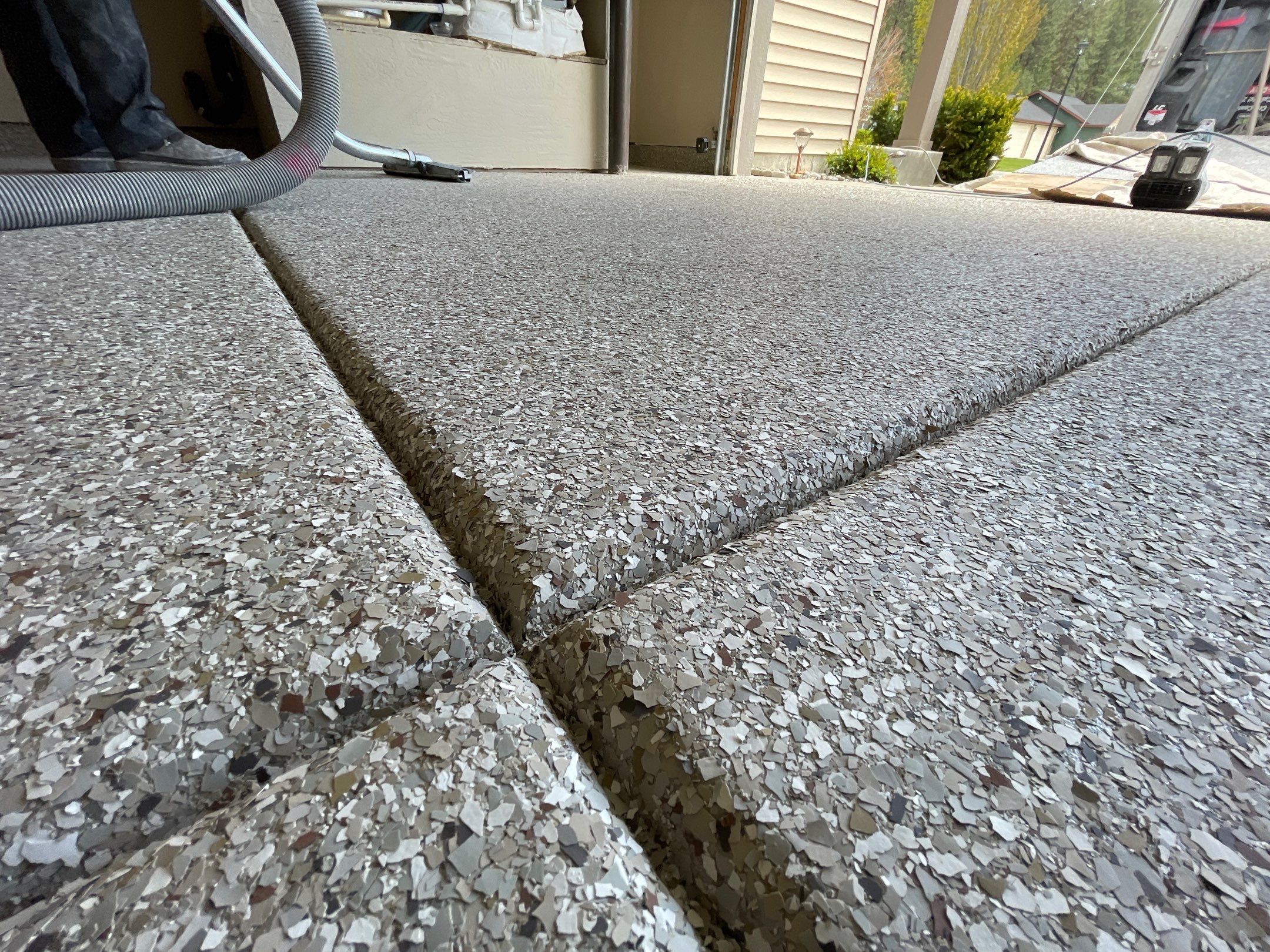 Garage Transformation using Pebble Beach and Front Porch using Greystone by Croc Coatings, LLC