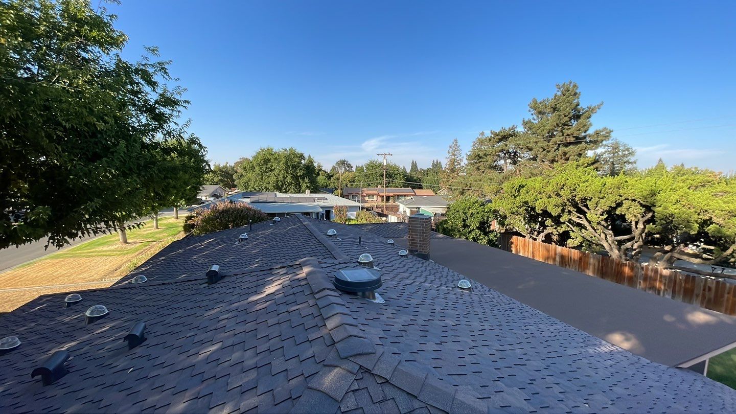 Installation of Certainteed Presidential shingles on residential house by Straight Edge Roofing Inc