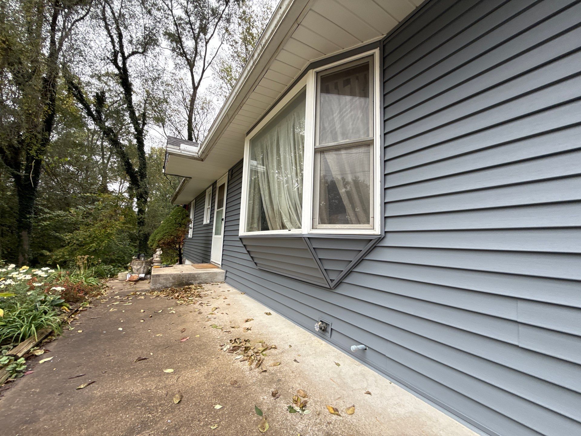 Feeling Blue in Weston Mo - Time for a Makeover by EEC Windows, Siding & Roofing