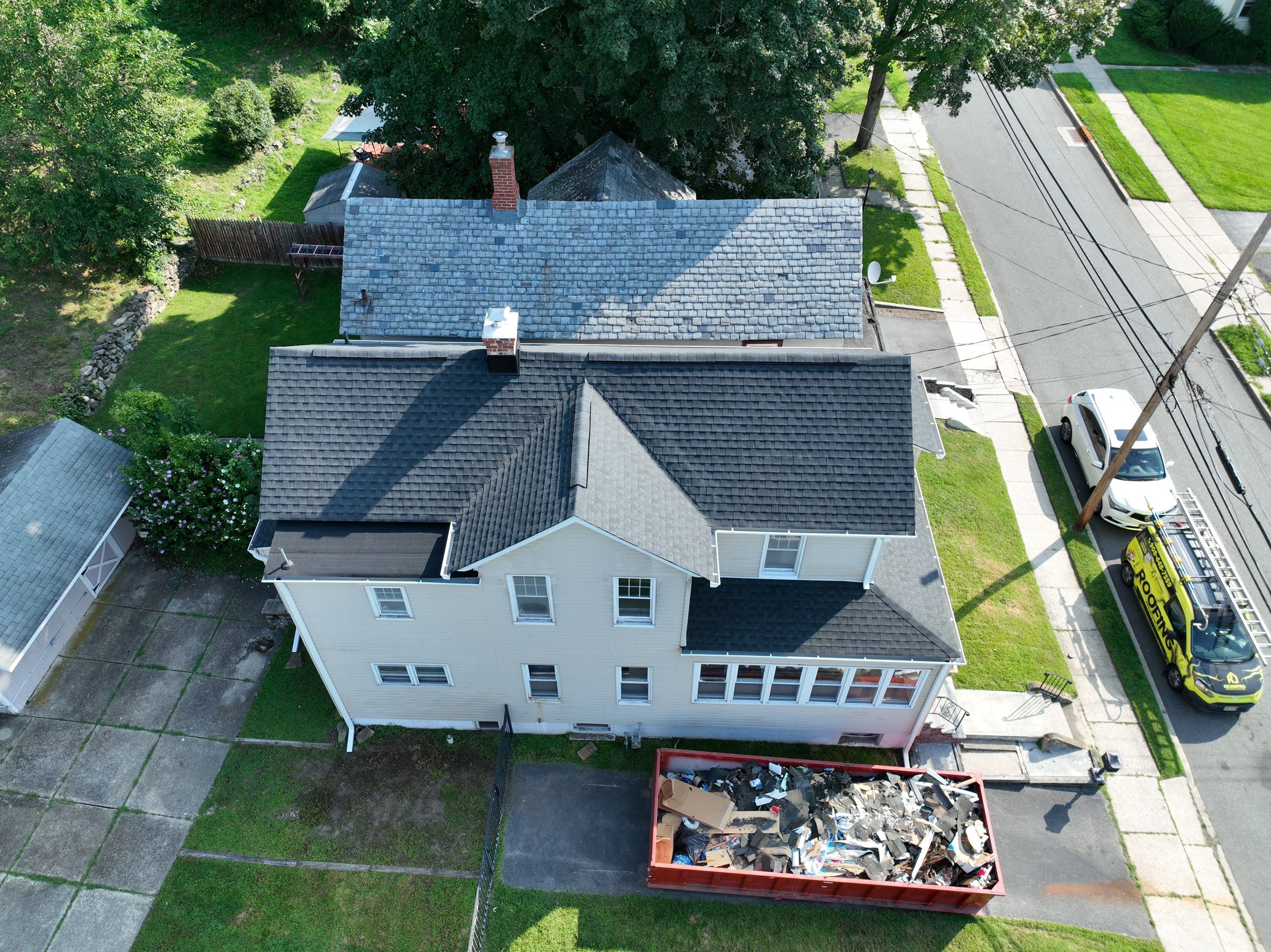 Newton Roof Replacement Featuring GAF Timberline Shingles and New Windows by REVIXPRO 