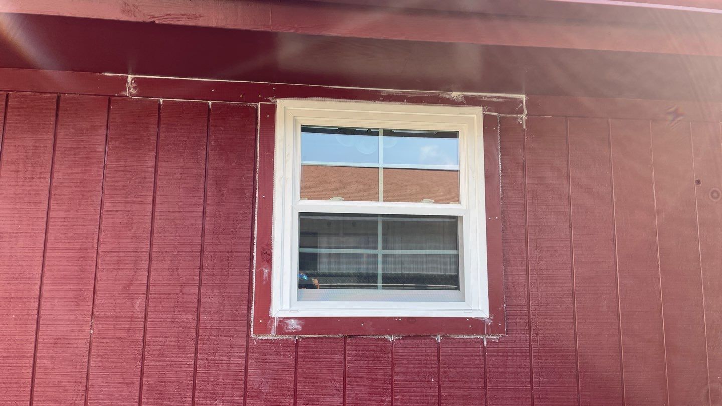 Black and white and red all over by Bayfront Roofing and Construction