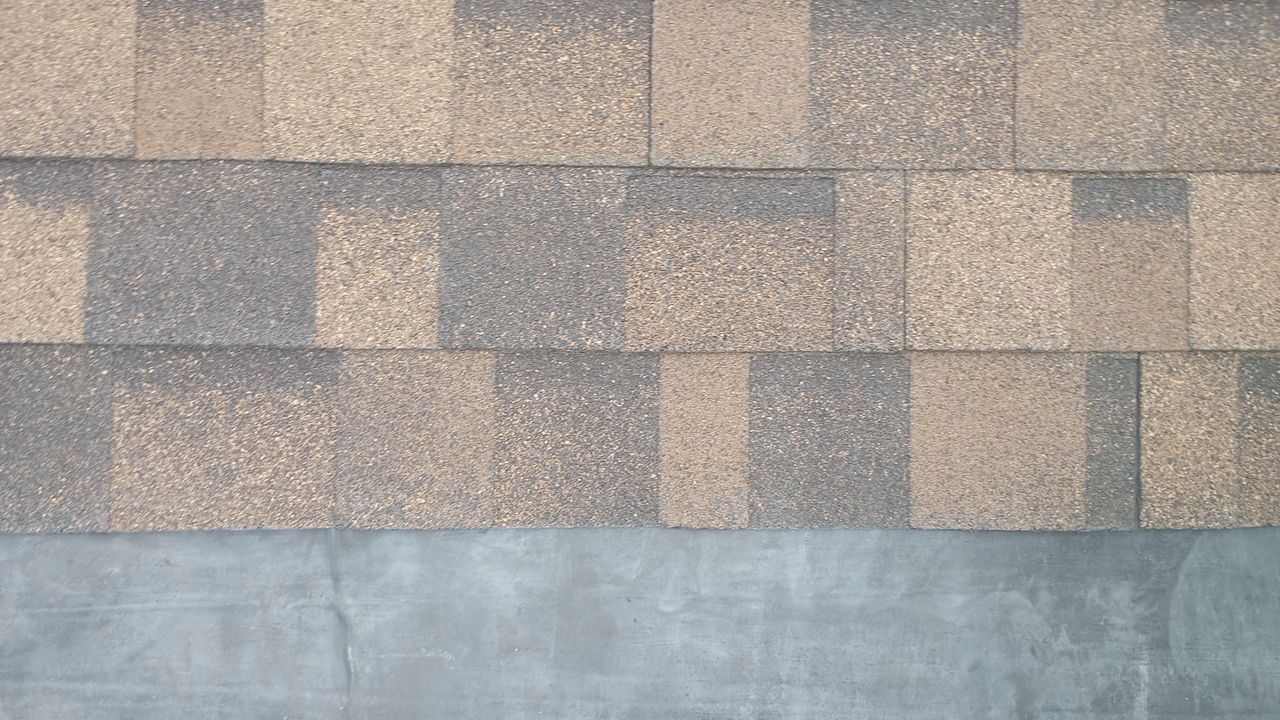 Commercial Roofing Installation using Performance Shingles by Mr. Roofer