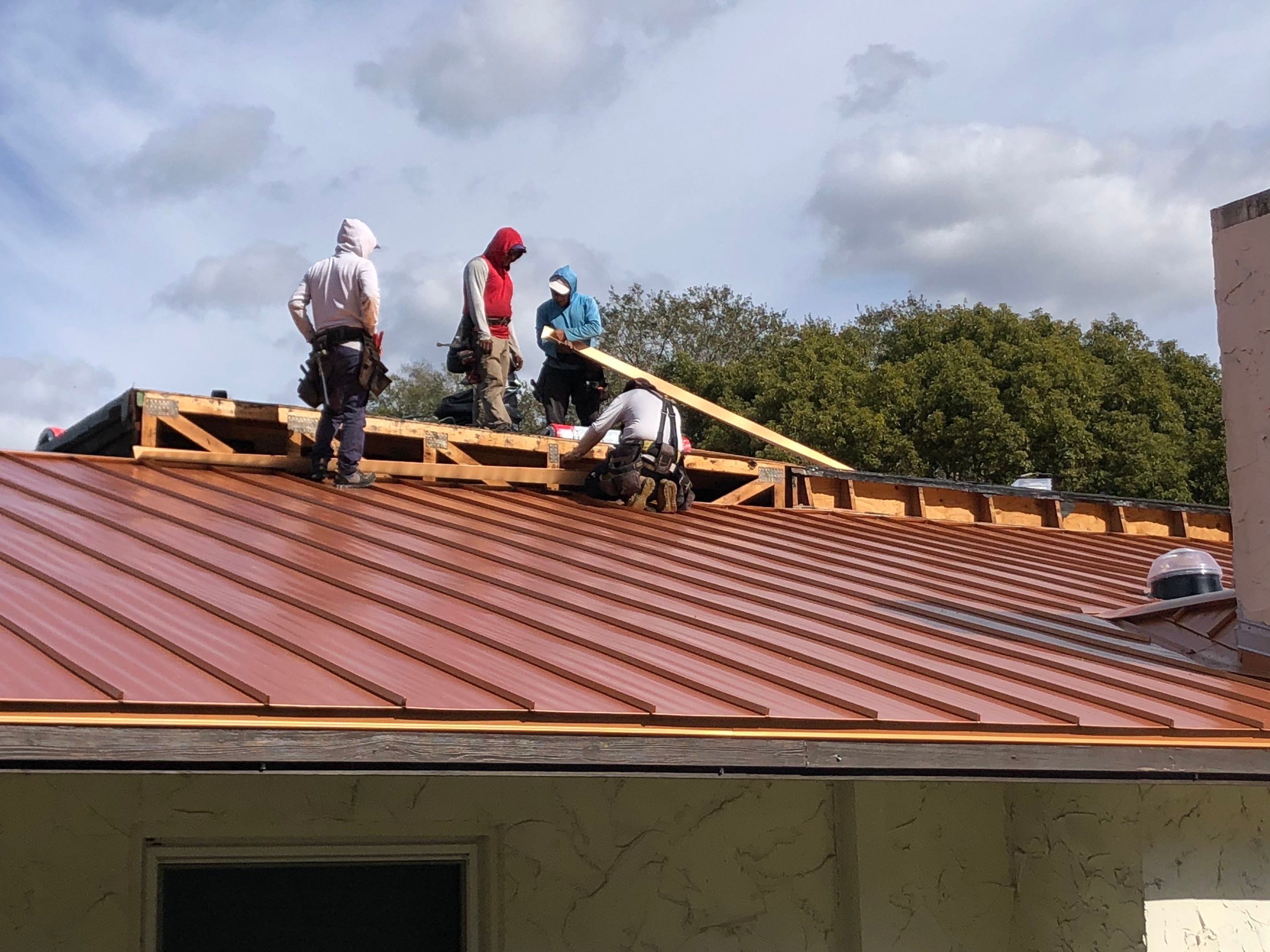 Residential Re-Roof using MS Metals, Copper Penny, Standing Seam. by First Due Roofing