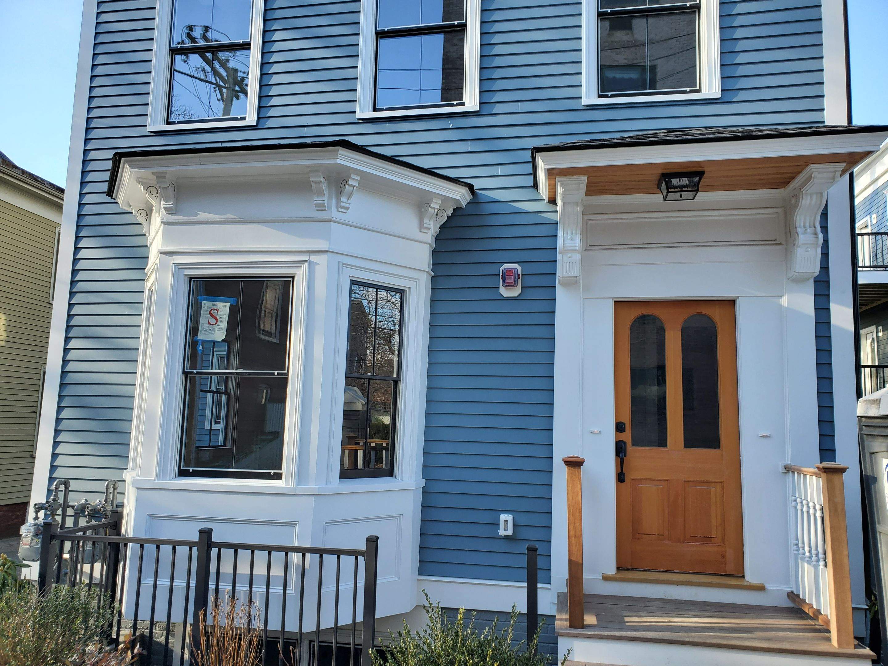 Siding Installation using Wood Clapboards by UBrothers Construction