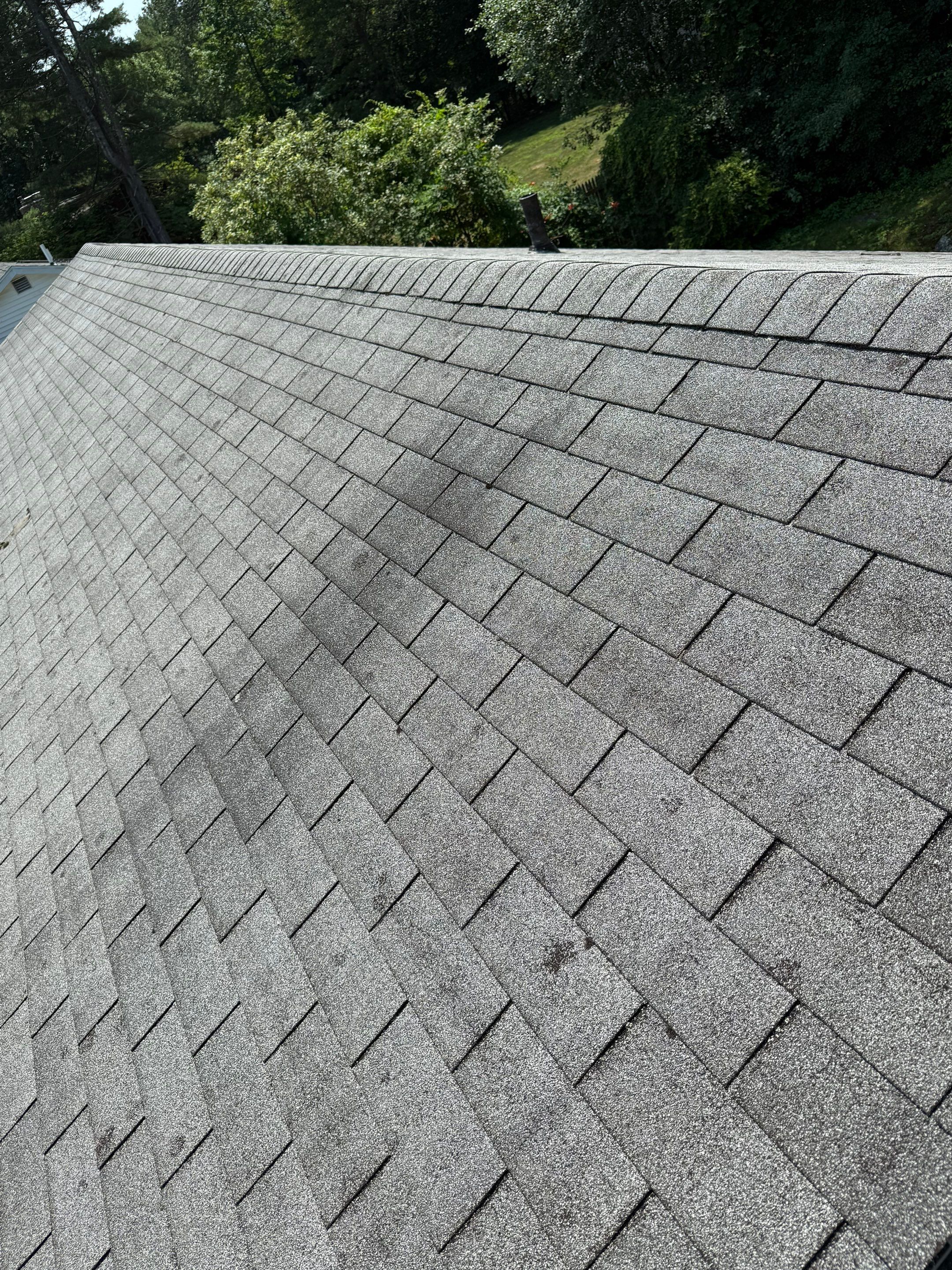 Onyx Black Roof Transformation in Maynard, MA by Mighty Dog Roofing of Greater Middlesex County