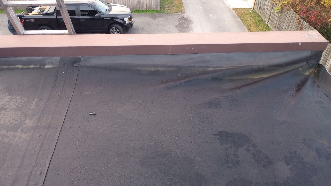 Commercial Roofing Installation using Performance Shingles by Mr. Roofer