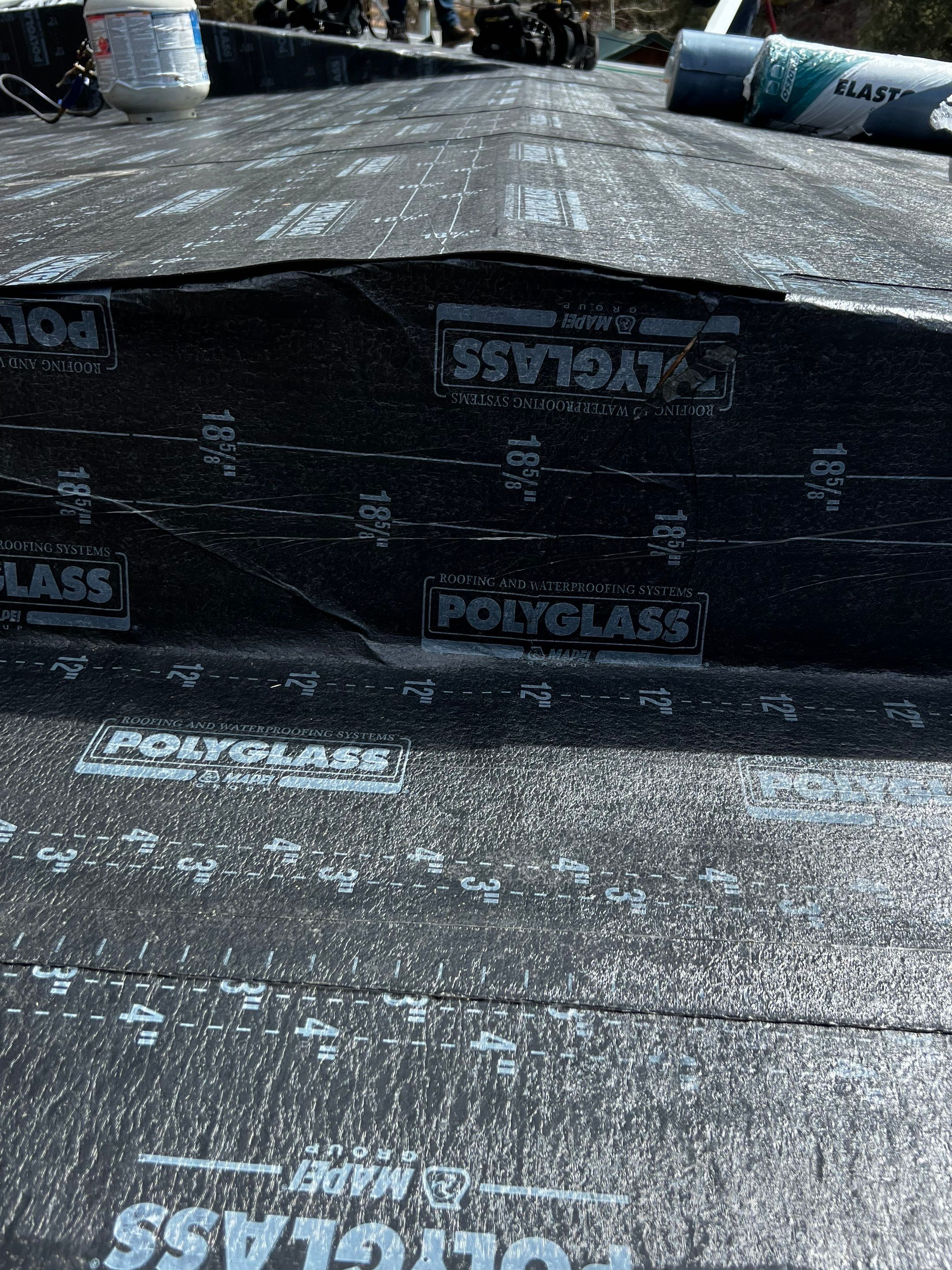 Residential Roofing Installation using Modified Bitumen Roofing by Blue Peaks Roofing LLC 