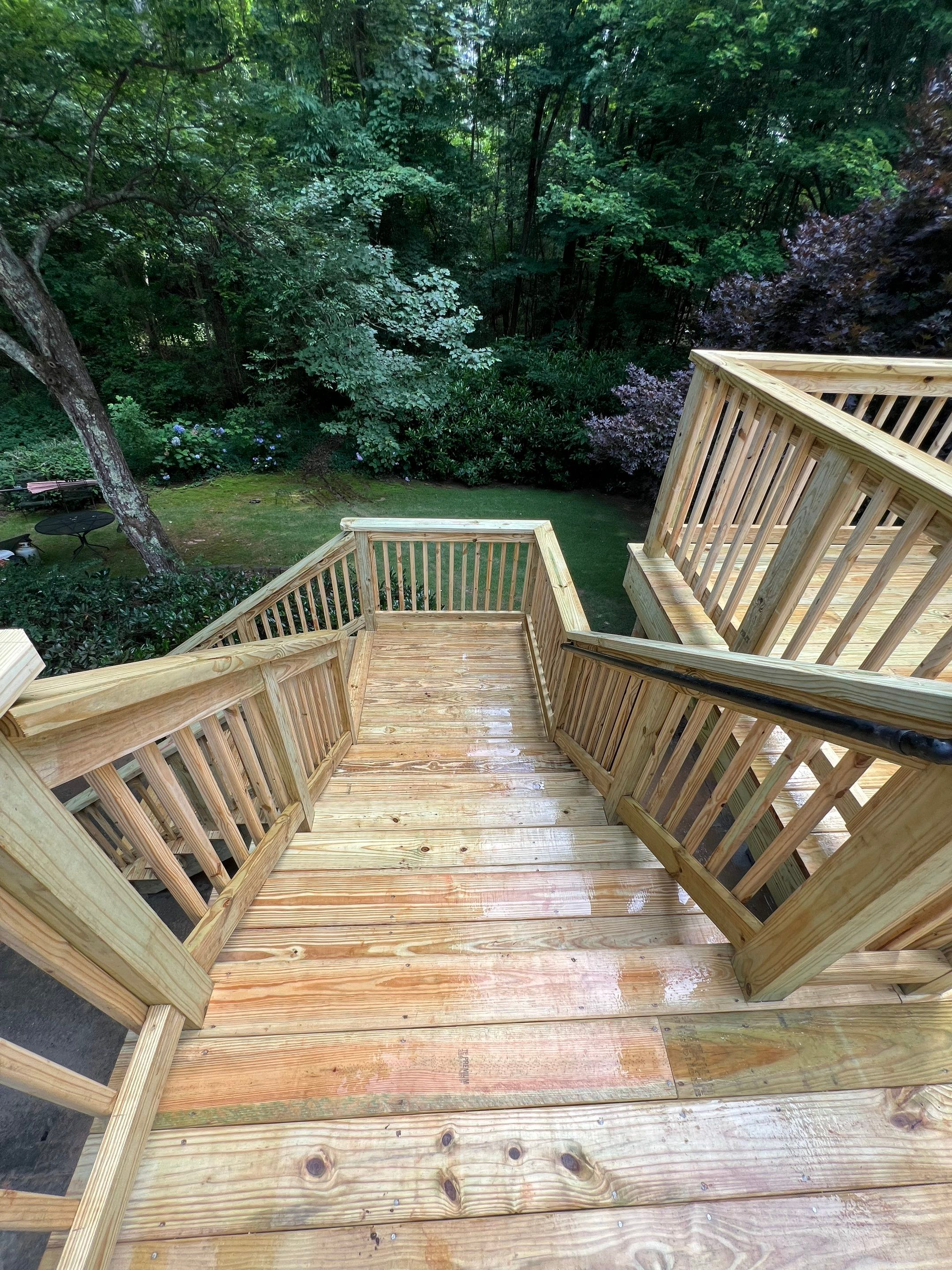 Pressure-Treated Wood Deck Replacement and Staircase Installation in Kennesaw by Swift Home Renovations