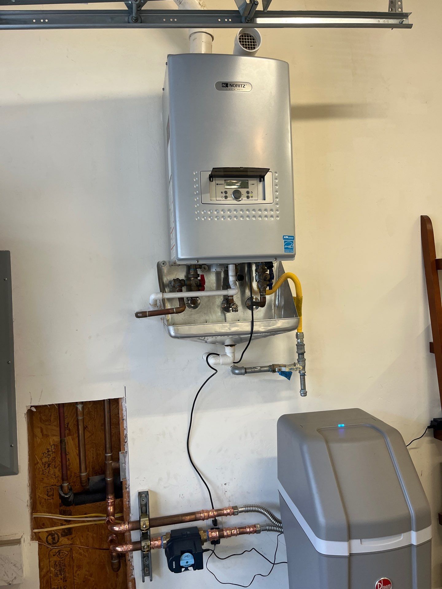 Water Softener, Moen Flo, and Tankless Water Heater Installation by Us Plumbing