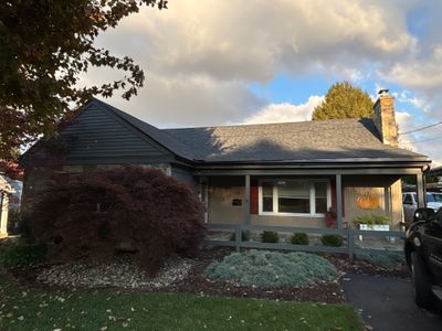 Residential Roofing Installation using Asphalt Shingles w/ New Gutters and Leaf guard