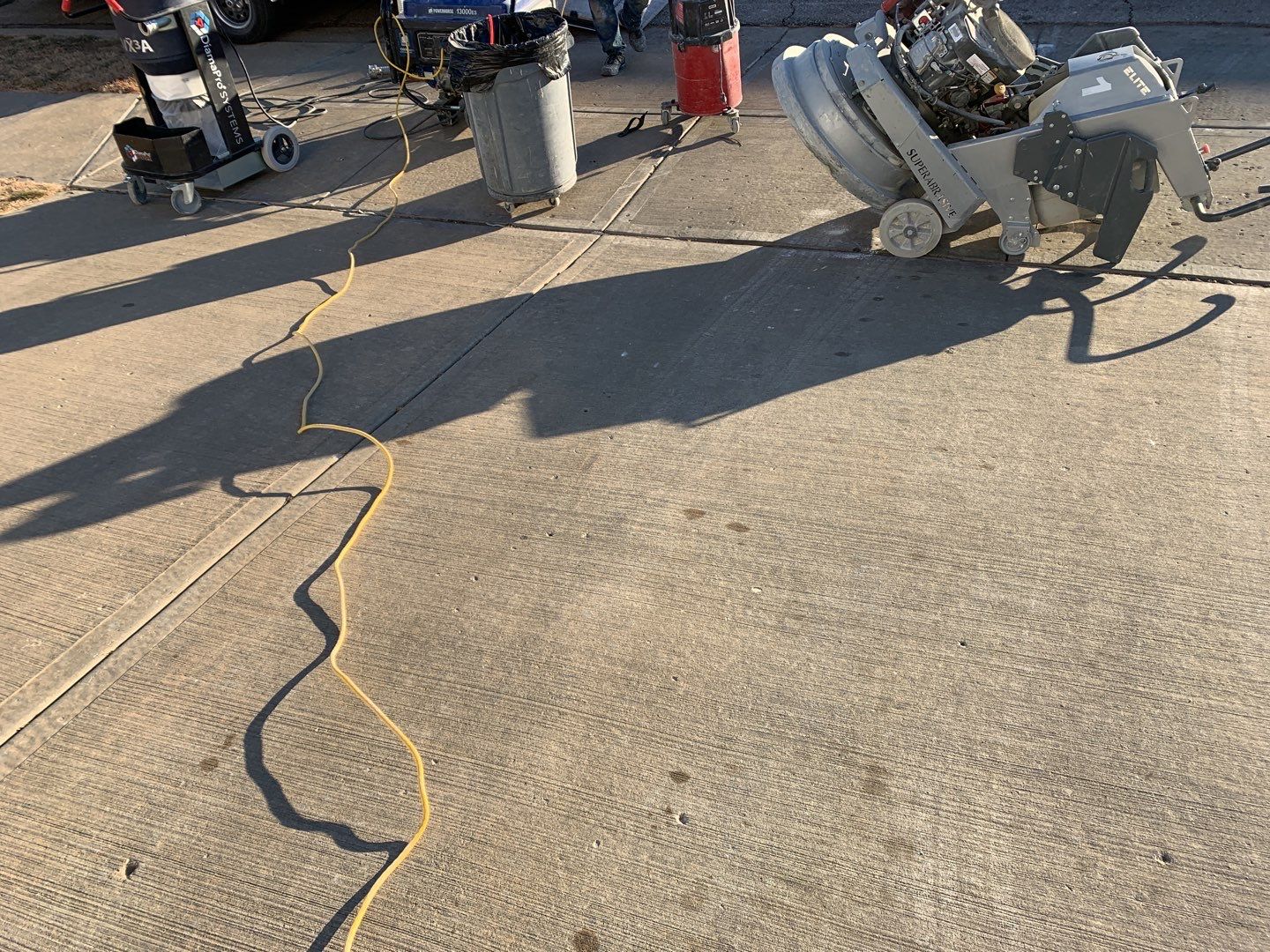 Driveway using Slate Stone by Select Painting, Coatings & Garage Cabinets