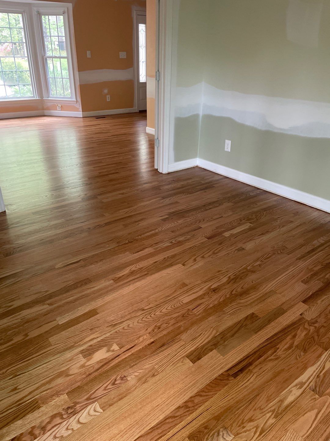 Red oak floor refinishing by Accent Custom Floors