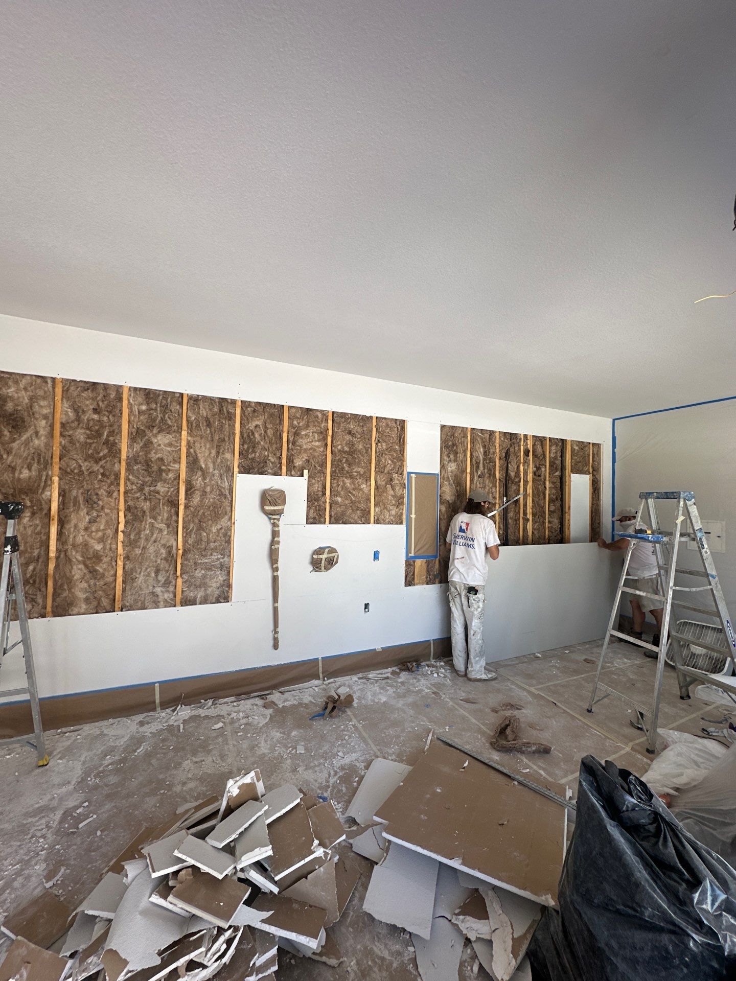 Kitchen Remodel/ Garage Gym Conversion by Apex Insulation Solutions