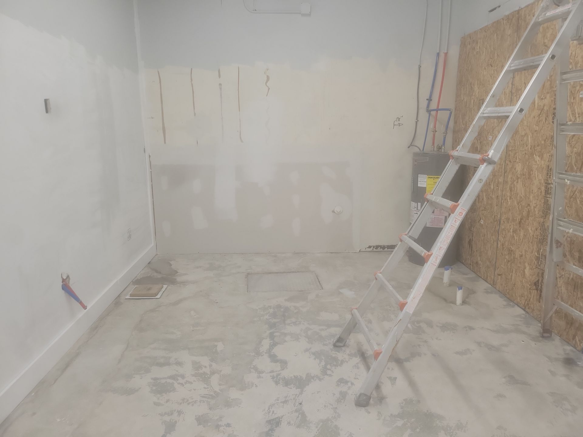 Silverado garage floor coating  by NG Masonry & Construction LLC