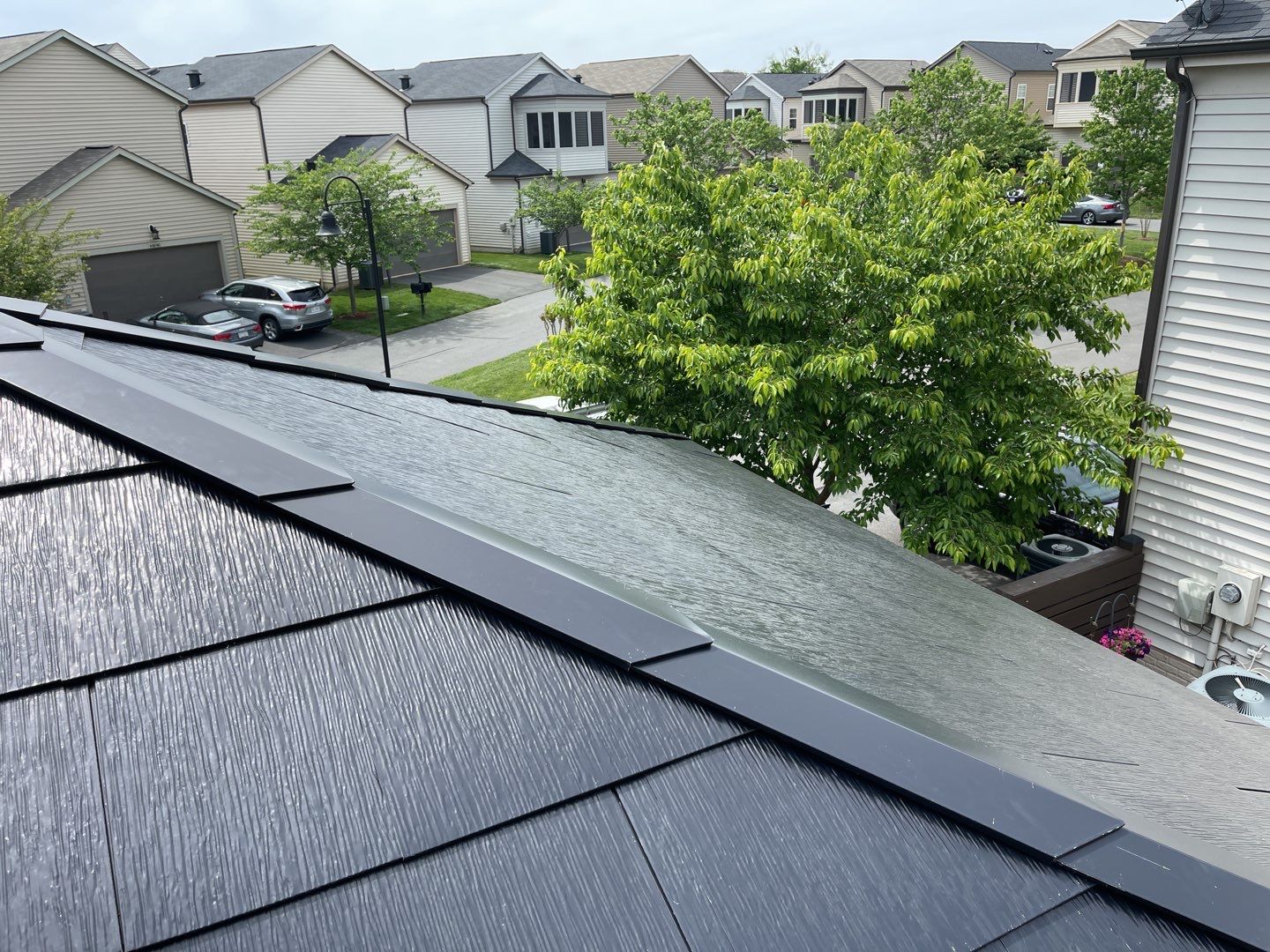 Tesla Solar Roof using Tesla Solar Roof V3 tiles by American Home Contractors