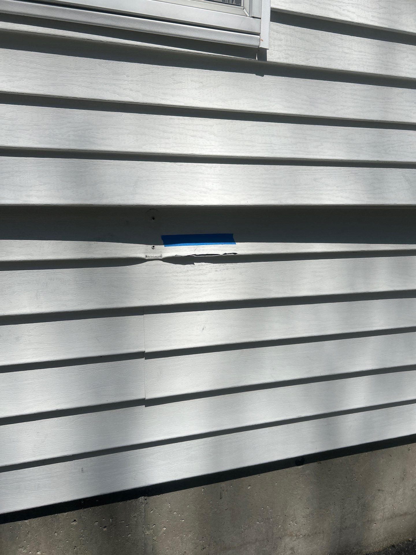 Vinyl Siding Repair with Spot Replacement by Mighty Dog Roofing of Greater Middlesex County