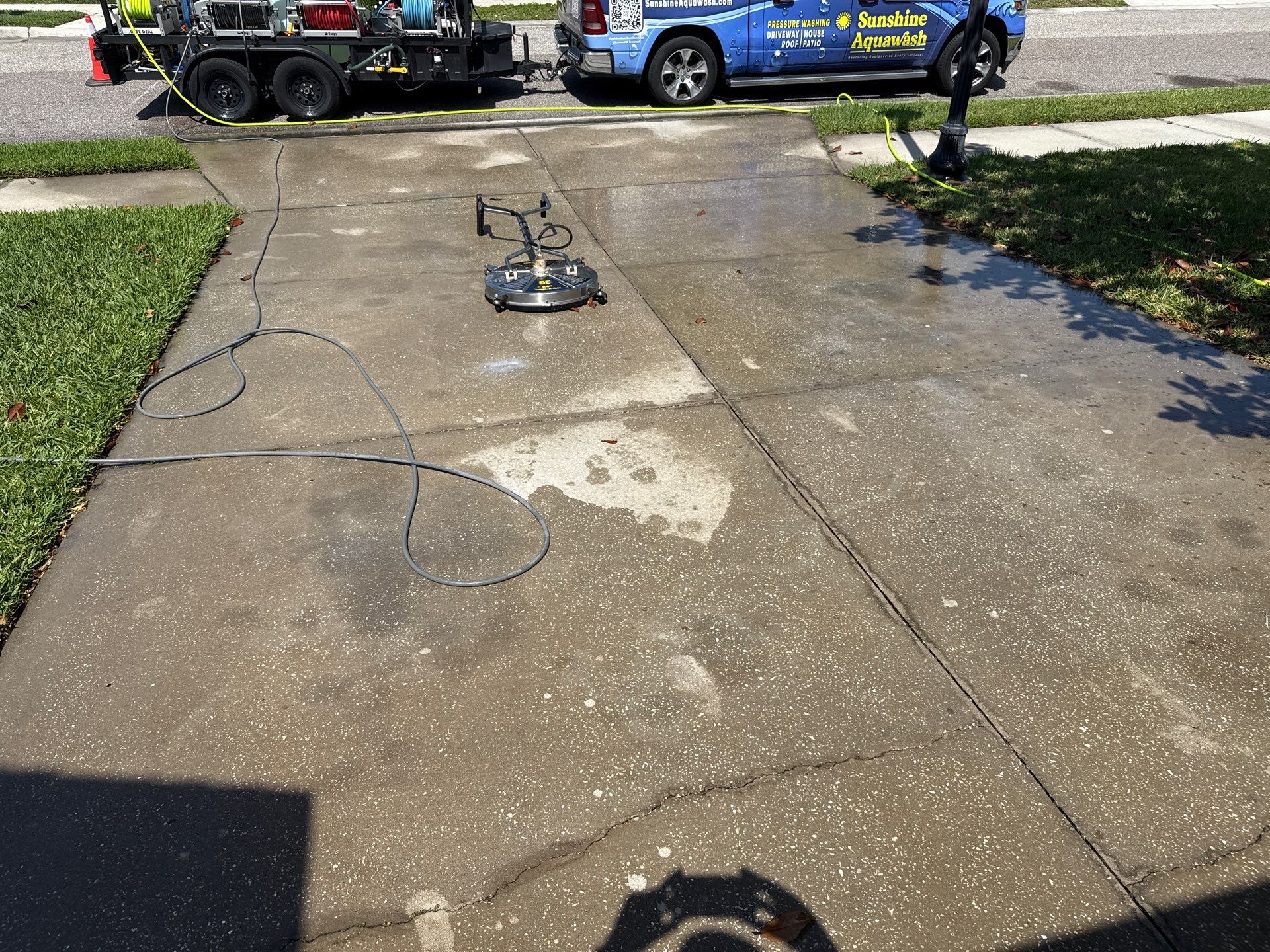 Concrete Driveway Oil Stain Removal | Harrison Ranch Community | Parrish, FL by Sunshine AquaWash