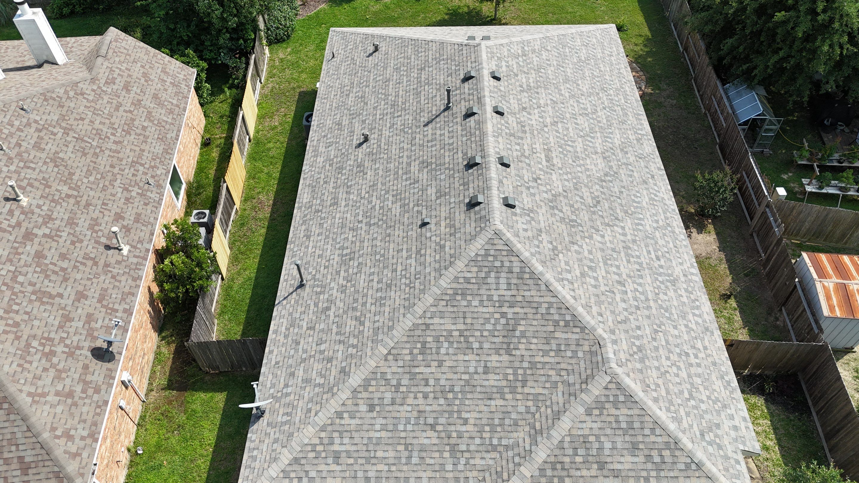 Residential Roofing & Gutter Installation using IKO Dynasty by Core Four Roofing