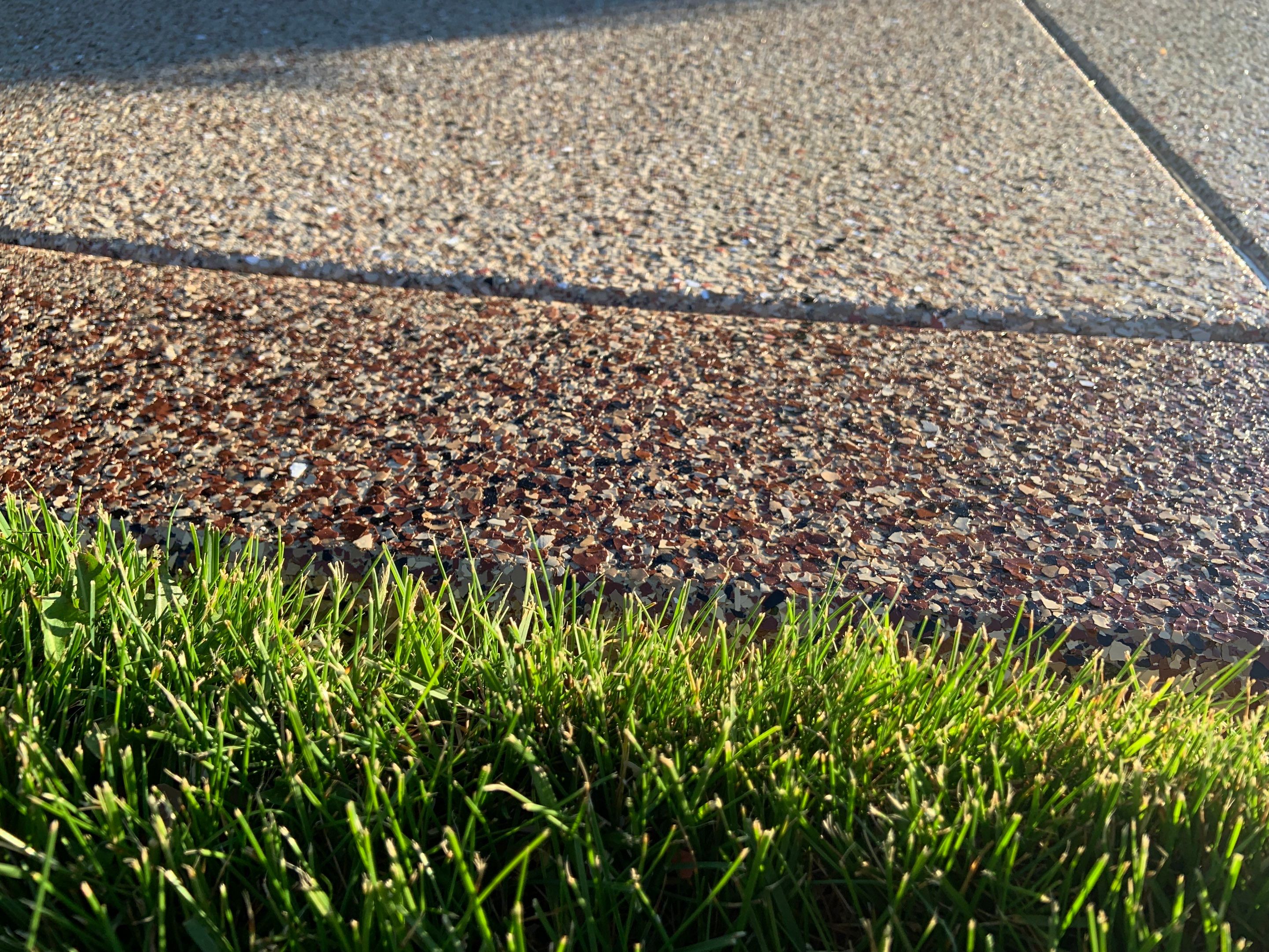 Driveway using Pecan and Chestnut Trim by Croc Coatings, LLC