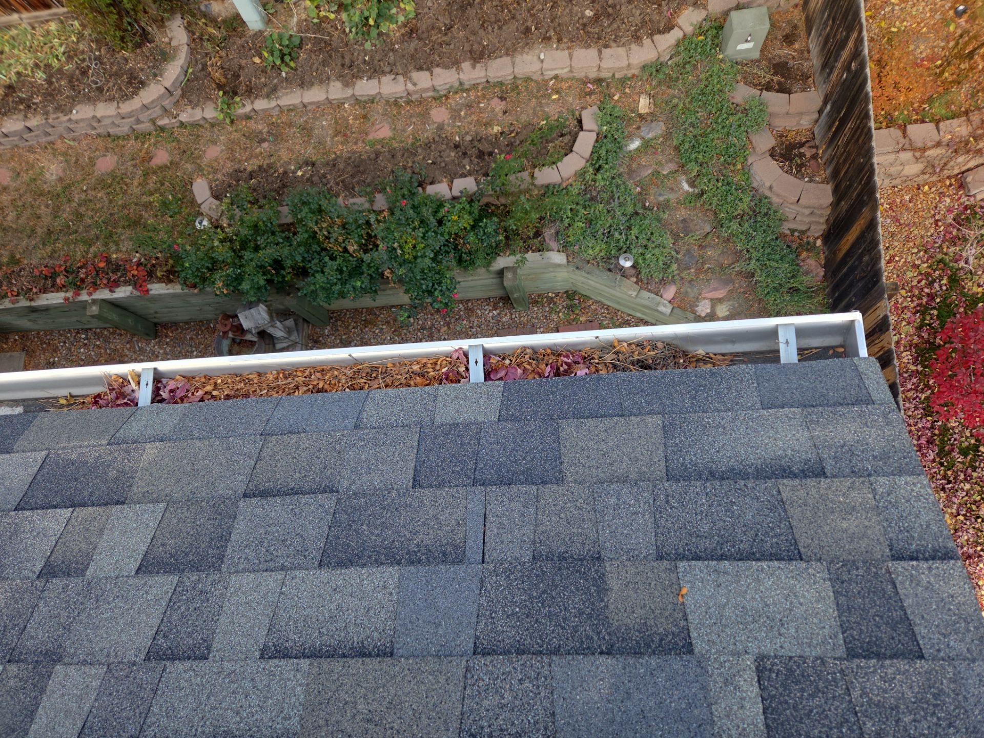 Gutter and Downspout Cleaning by RTP Roofing Company