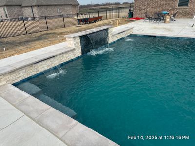 Geometric Pool with Raised Water-Feature Wall and Pergola