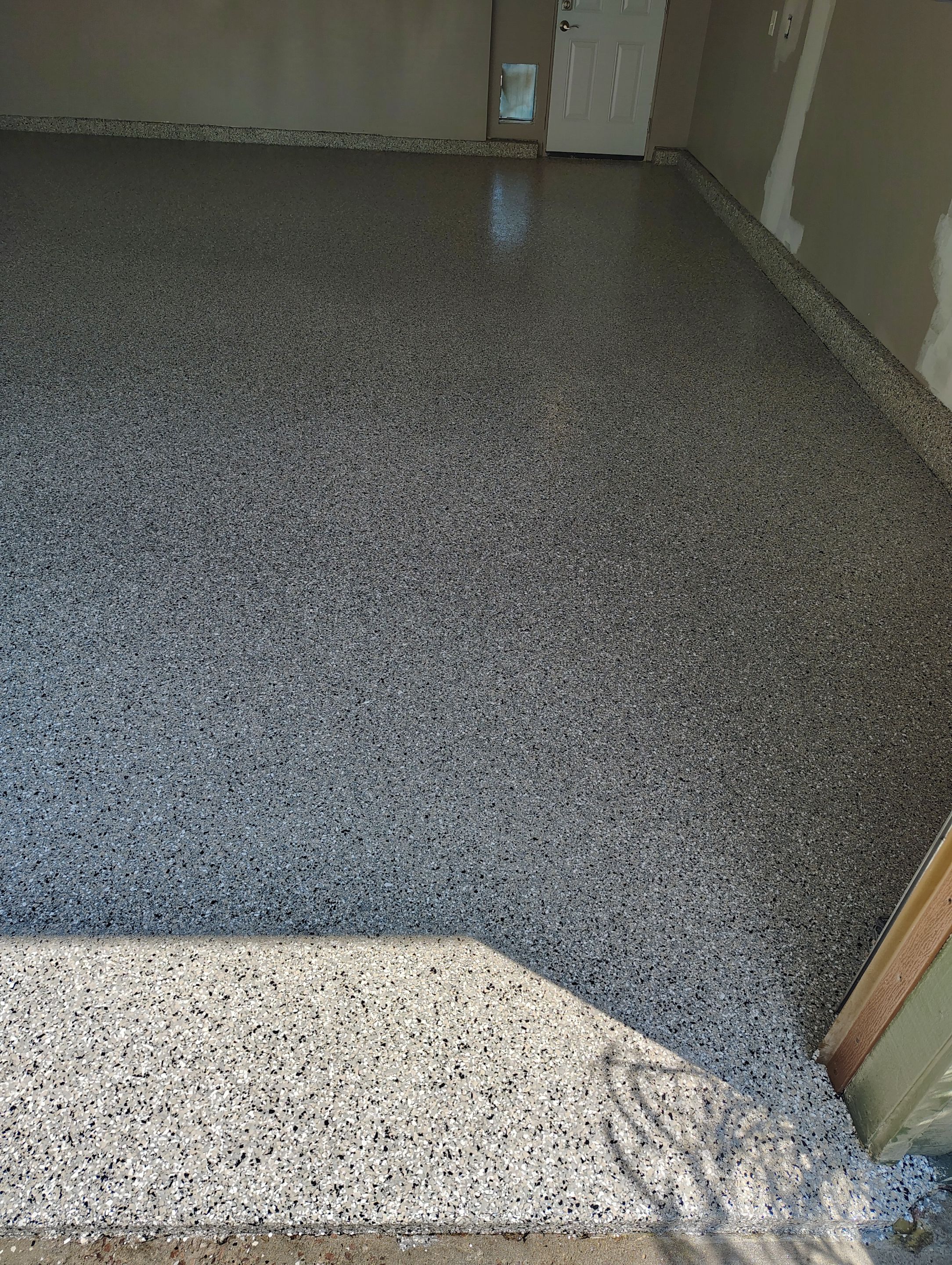 Garage Floor Coating with Decorative Flakes in Tea by Select Painting, Coatings & Garage Cabinets