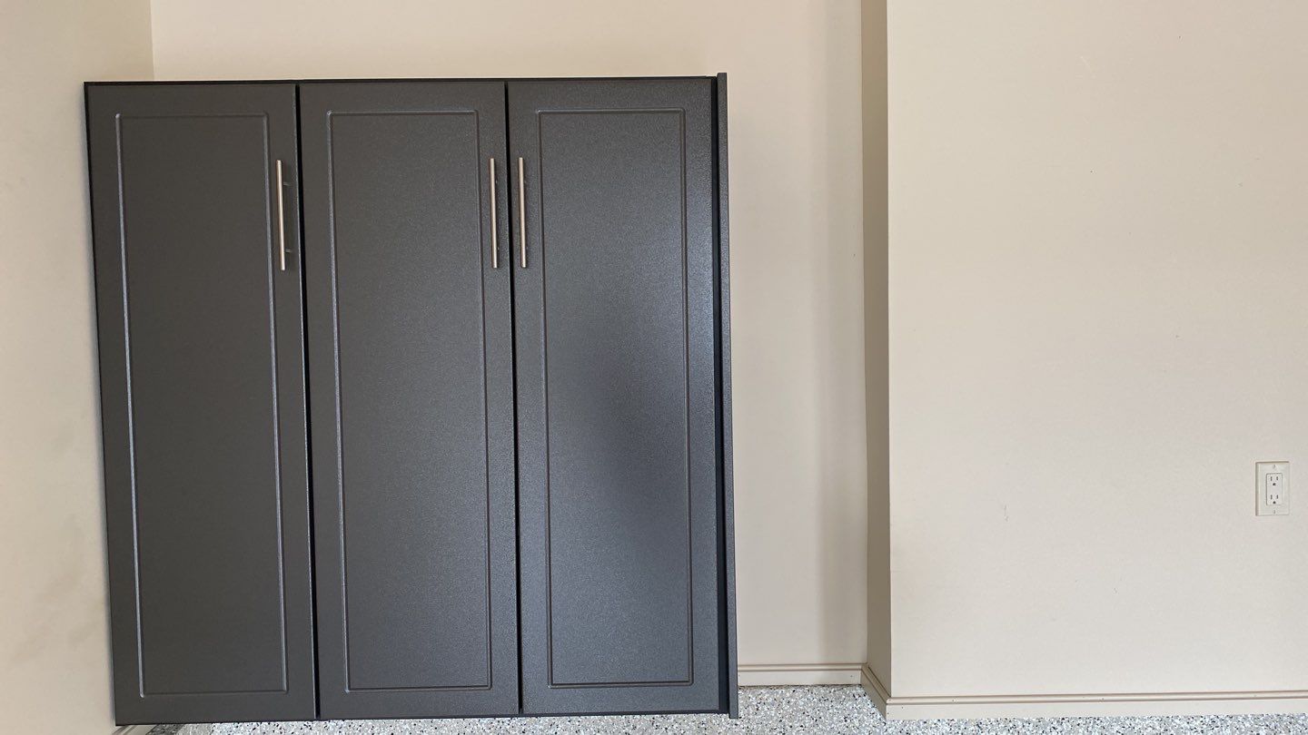 Judi K. adds storage to garage!  by Banner Garage