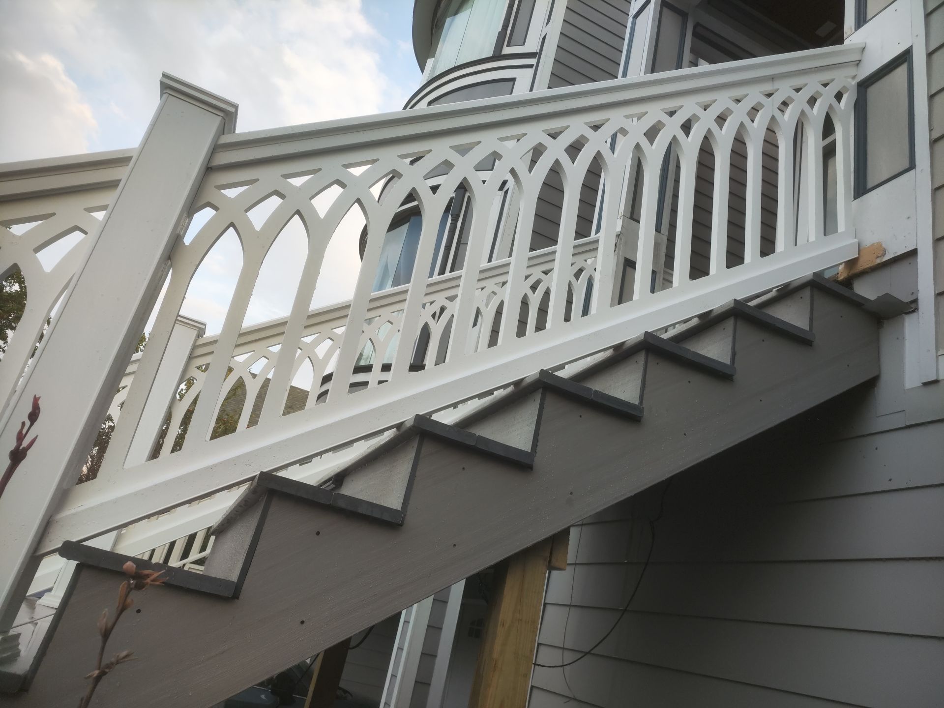 Timbertech Staircase with a 50 year warranty and solar lighting by Majesty Construction