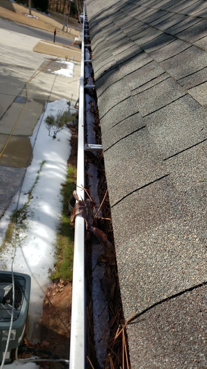 Gutter Cleaning using water by Power Wash Masters LLC