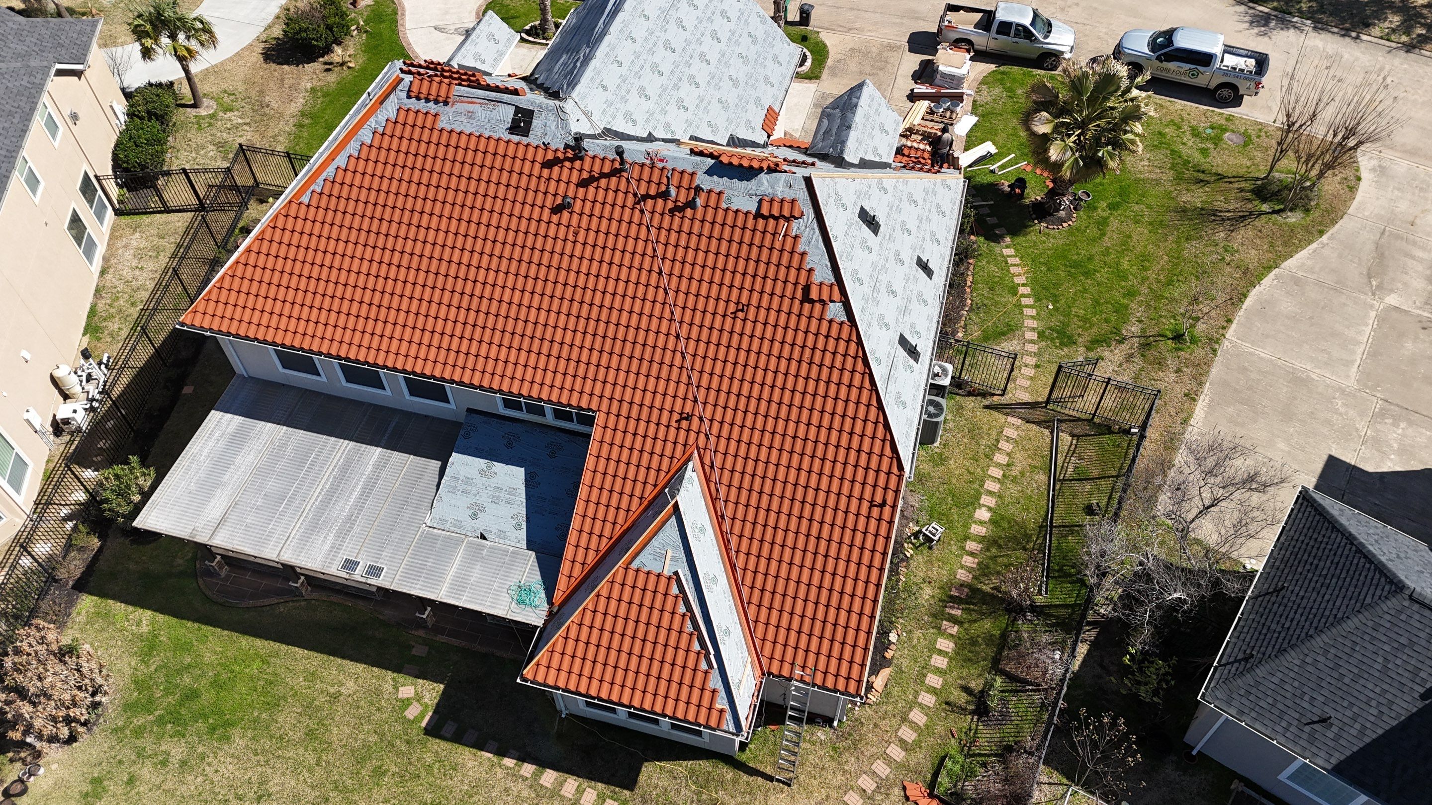 Stunning transformation using DECRA Villa Tile!  by Core Four Roofing