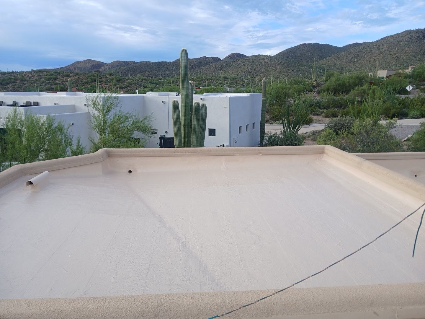 Residential Flat Roof Elastomeric Coating and Restoration in Tucson by West Coast Roofing AZ