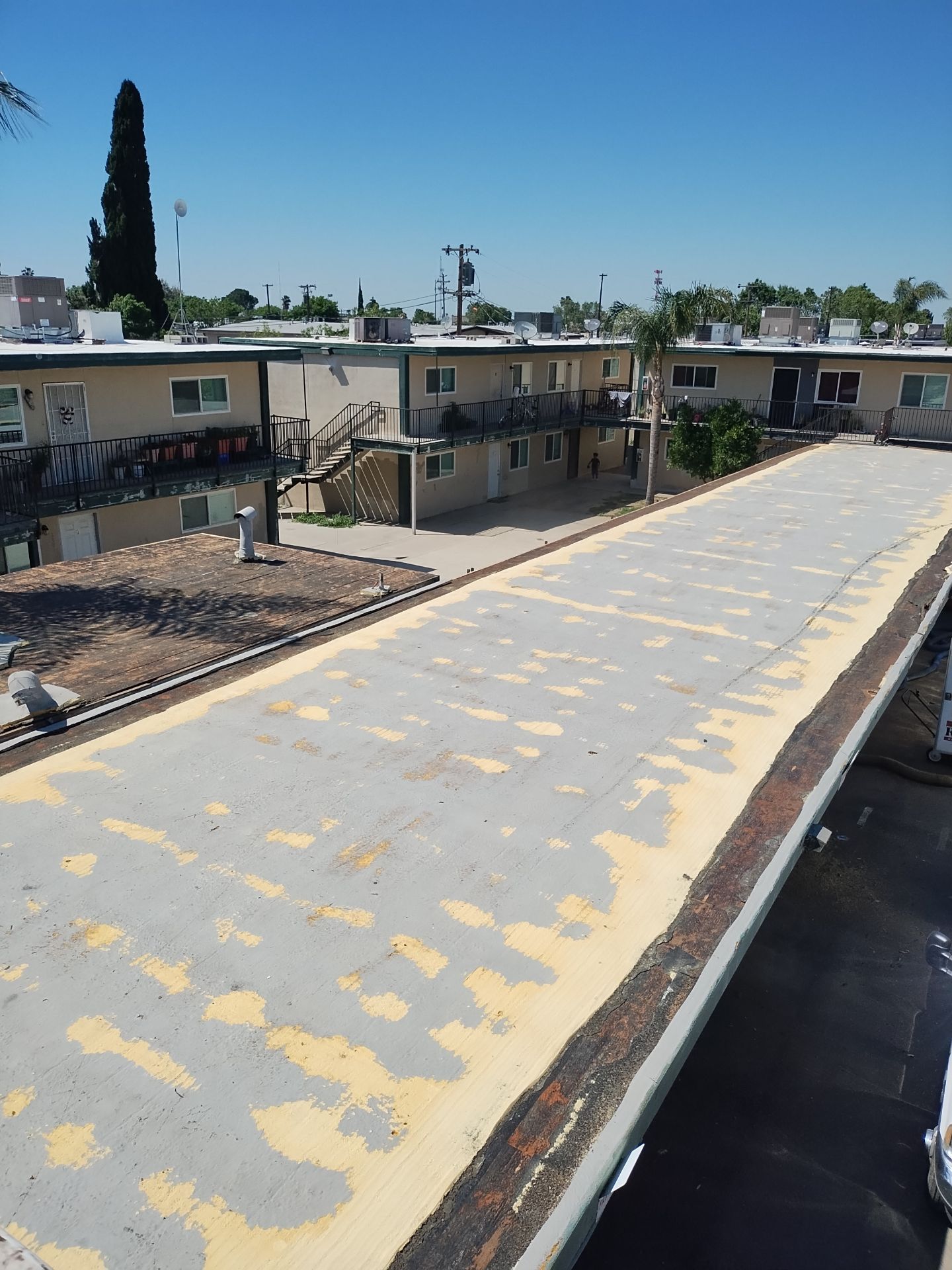 Foam Refurbish using General Coatings acrylic coatings and spray foam by Straight Edge Roofing Inc