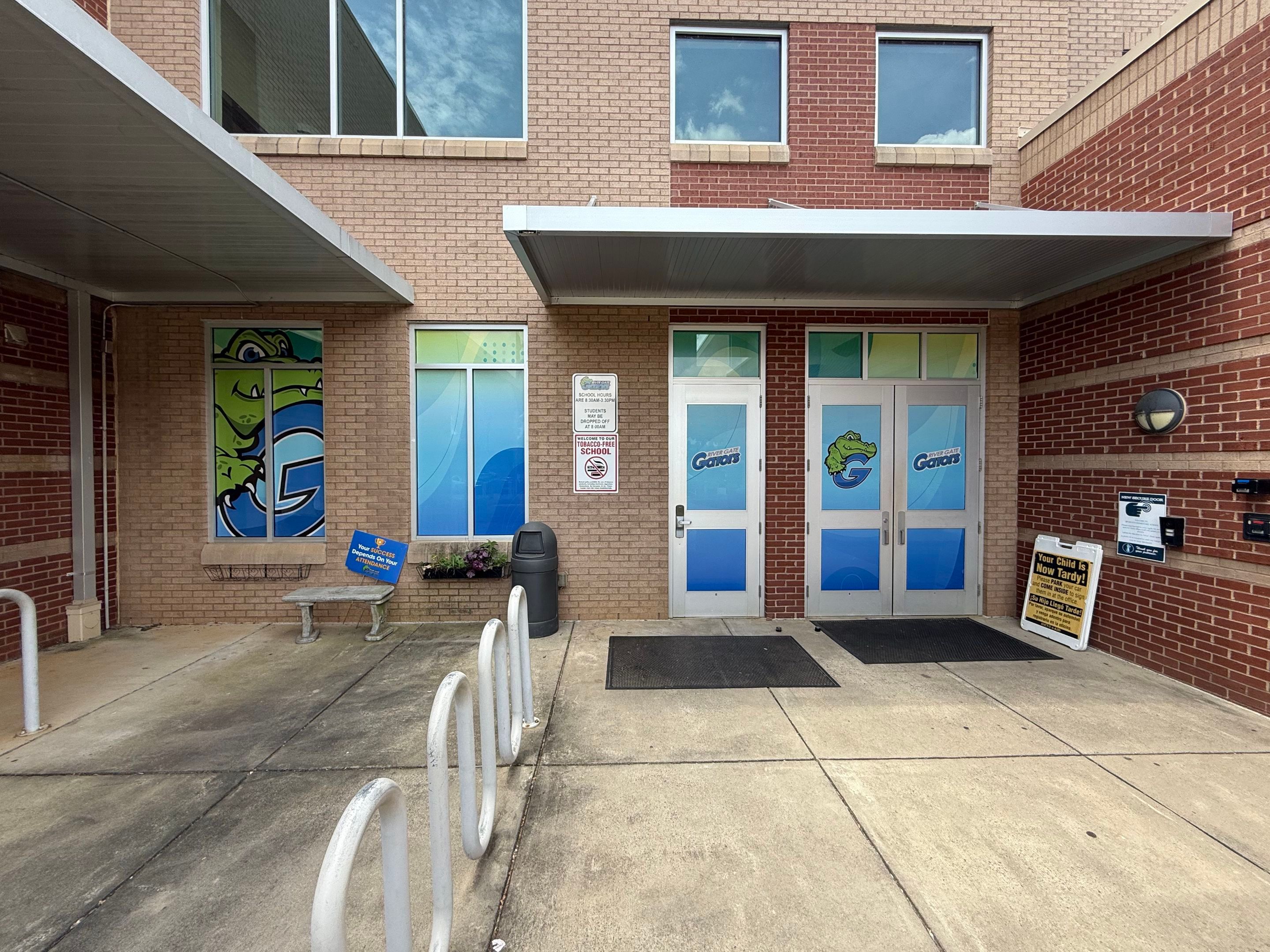 Rivergate Elementary - Window Safety Film Installation with Custom Graphics by QC Signs and Graphics