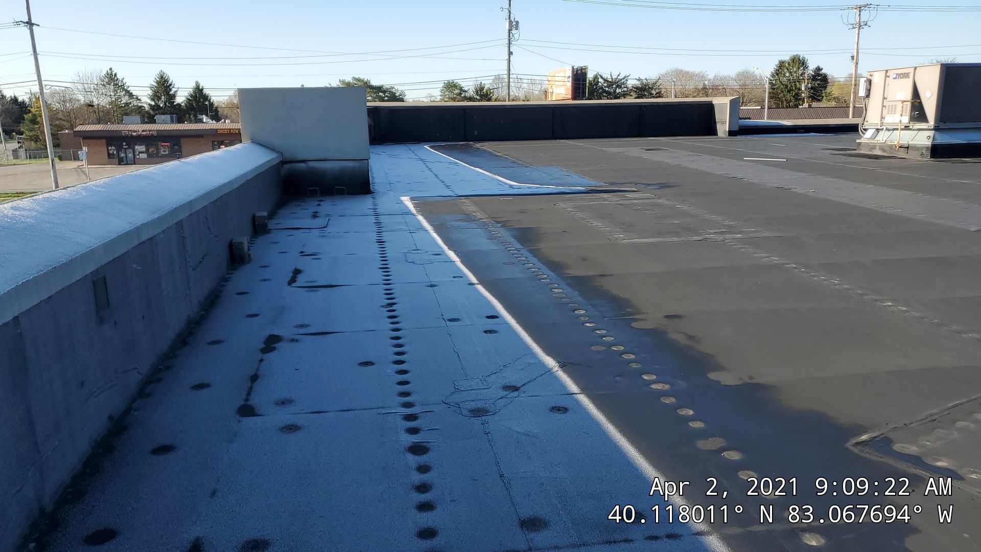 Fabric Reinforced Roof Coating by Gold Star Roofing LLC 