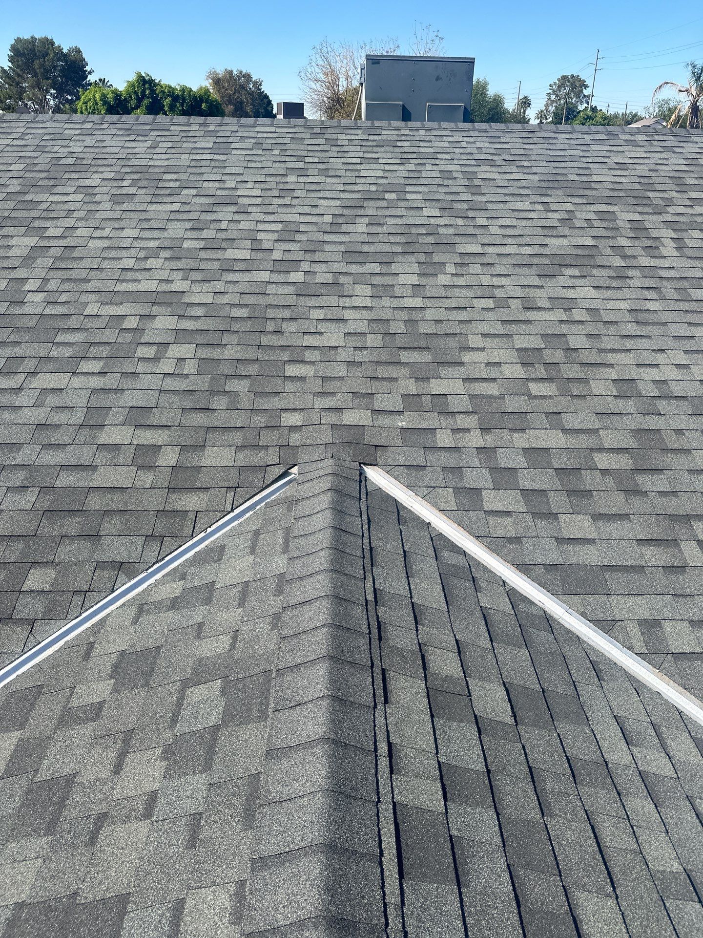 Estate Gray Shingles by Reimagine Roofing