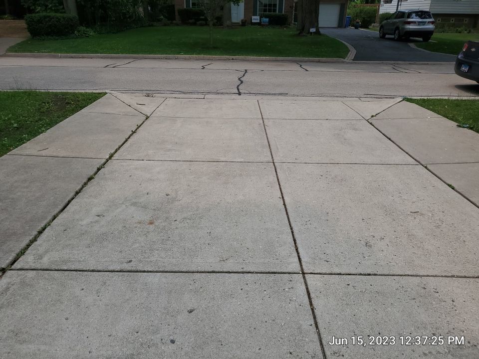 Highland Park, IL Bluestone, concrete,  Trex deck cleaning by Northern Power Washing LLC.