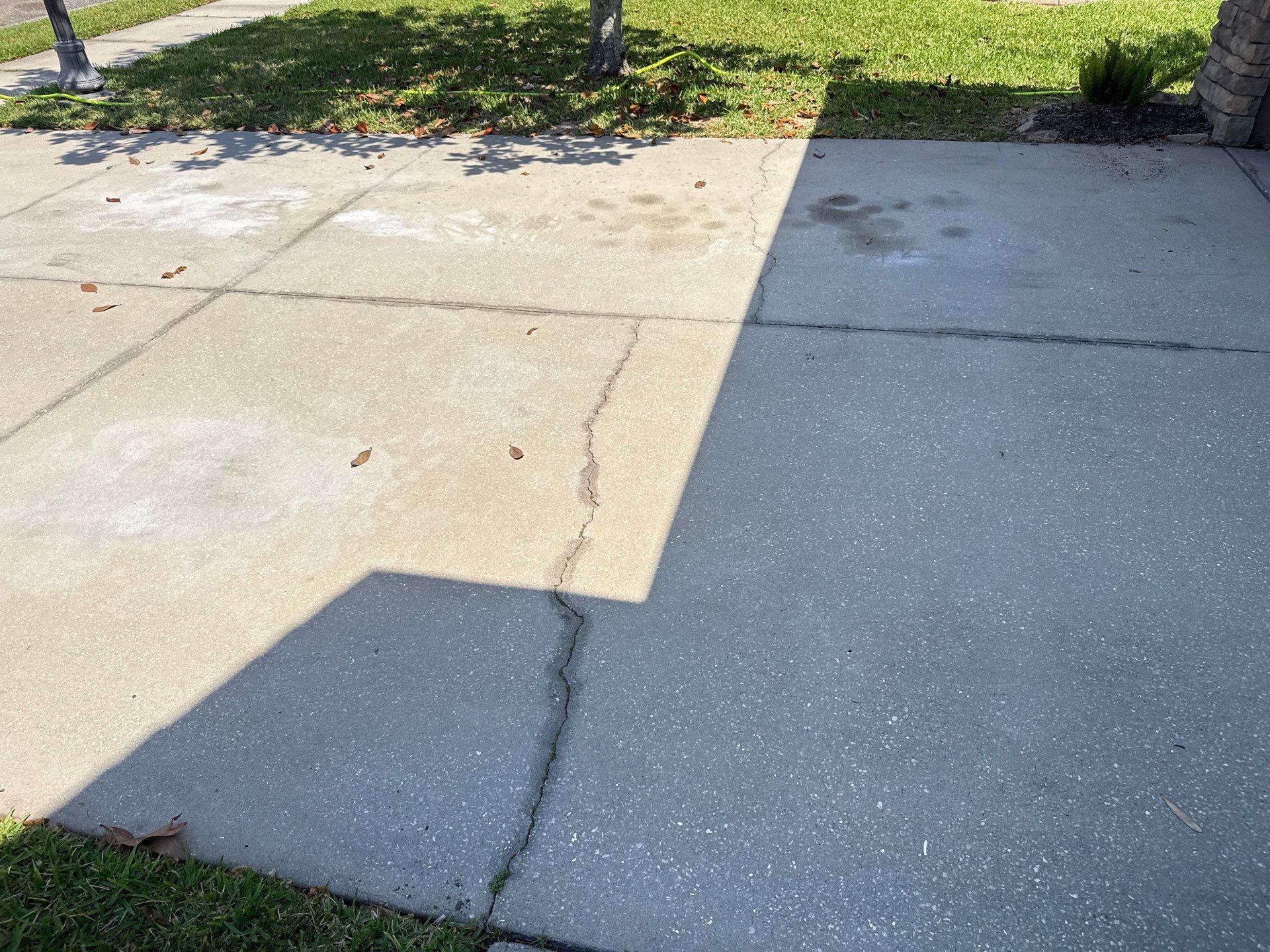 Concrete Driveway Oil Stain Removal | Harrison Ranch Community | Parrish, FL by Sunshine AquaWash
