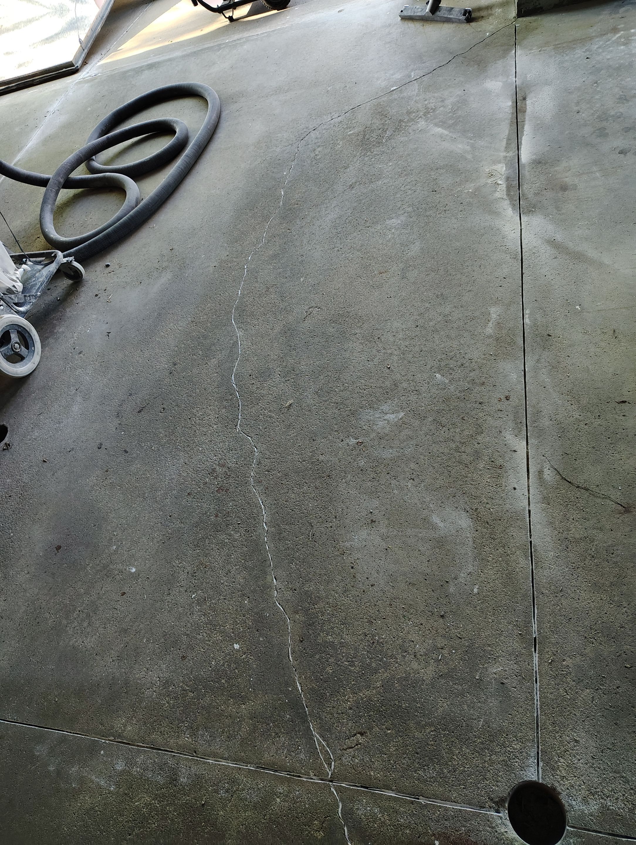 Sioux Falls Garage Concrete Repair and Epoxy Flake Floor Coating by Select Painting, Coatings & Garage Cabinets