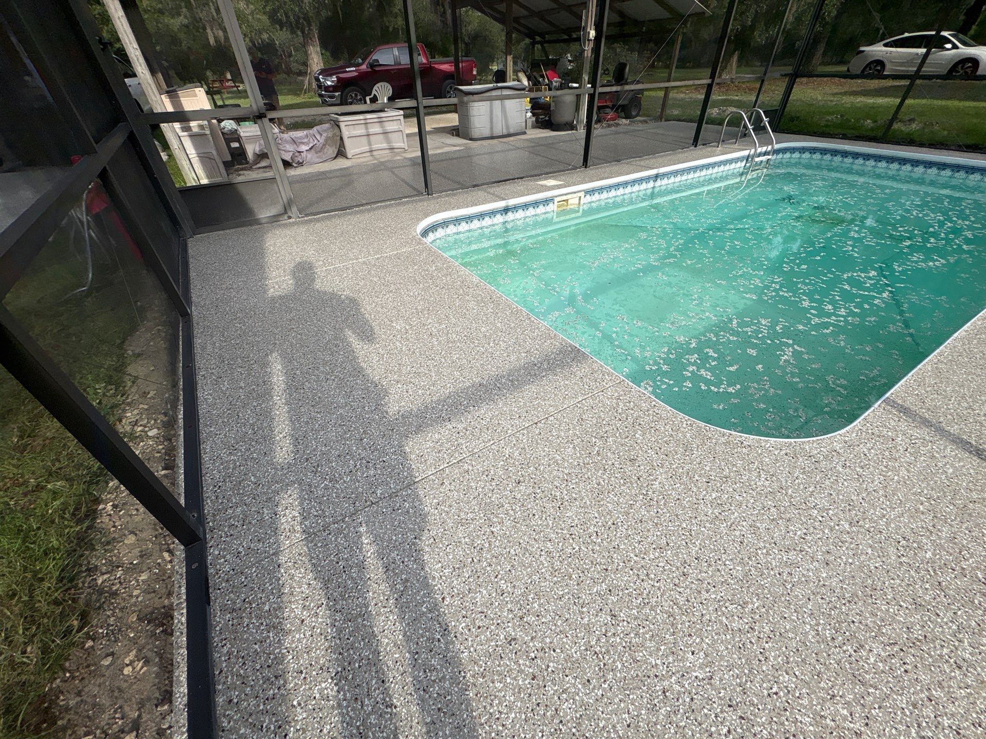 Pool Deck and Driveway in Pebble Beach by Cross Creek Concrete Coatings