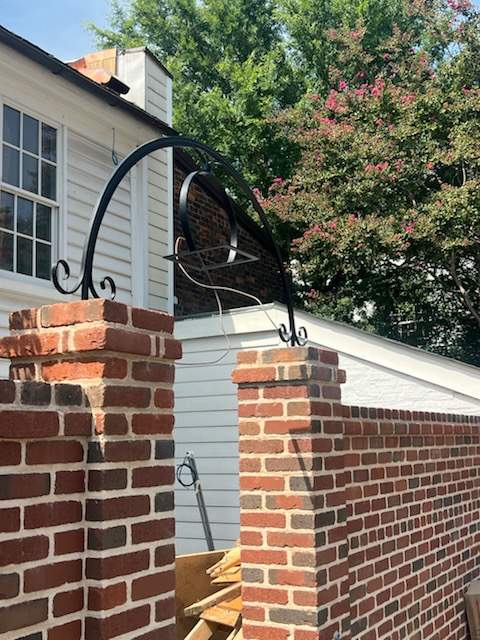 Custom Ornamental Steel Archway Installation in Alexandria by Capitol Iron Works