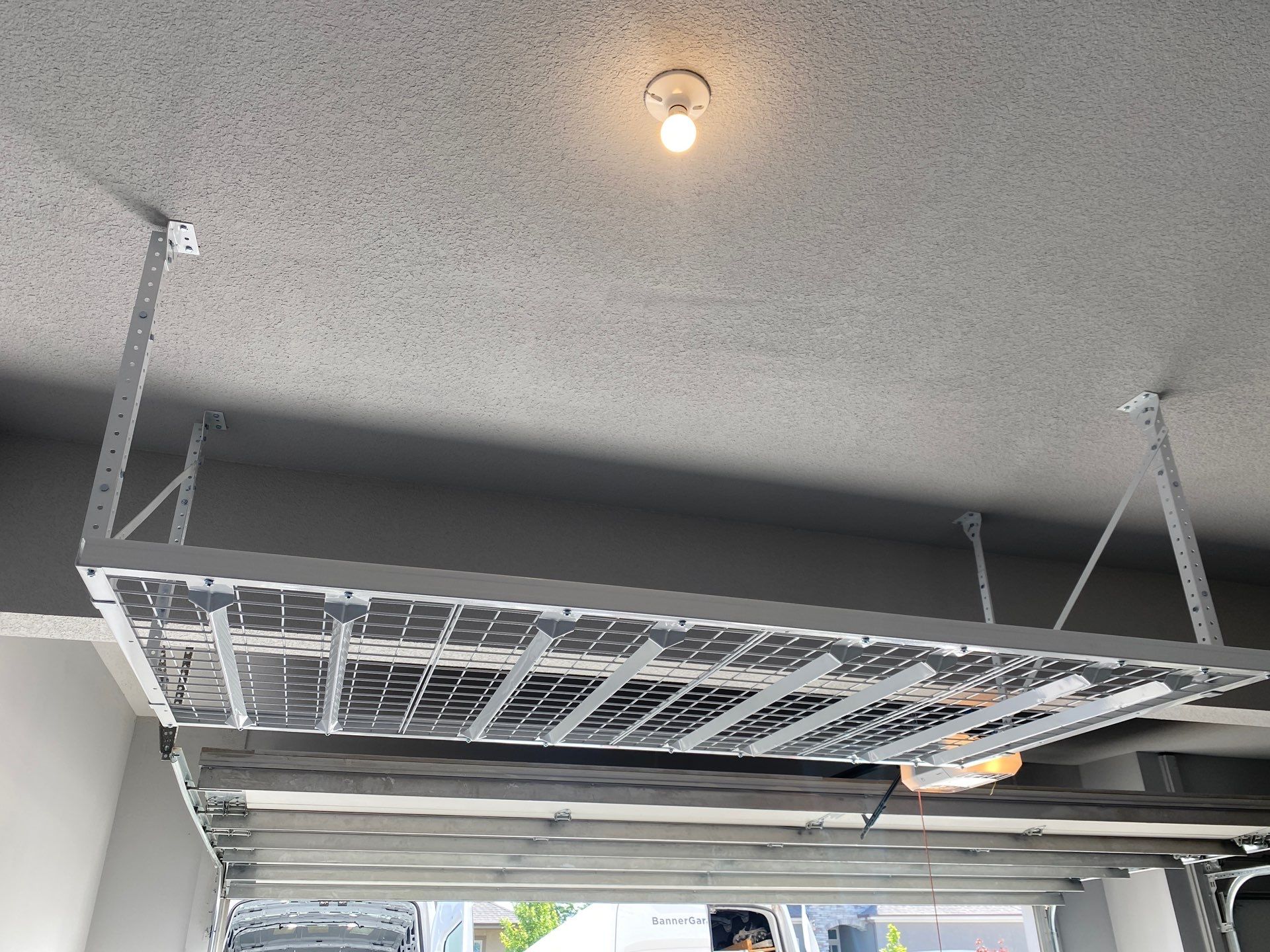 Karen A. adds ceiling rack to garage! by Banner Garage