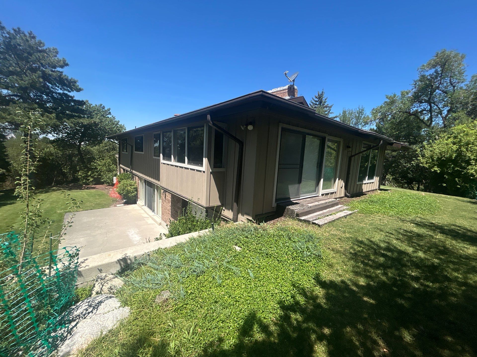 Complete Hardie Colorplus Board and Batten replacement with Custom Soffit Transformation in Sandy by Ideal Siding Utah