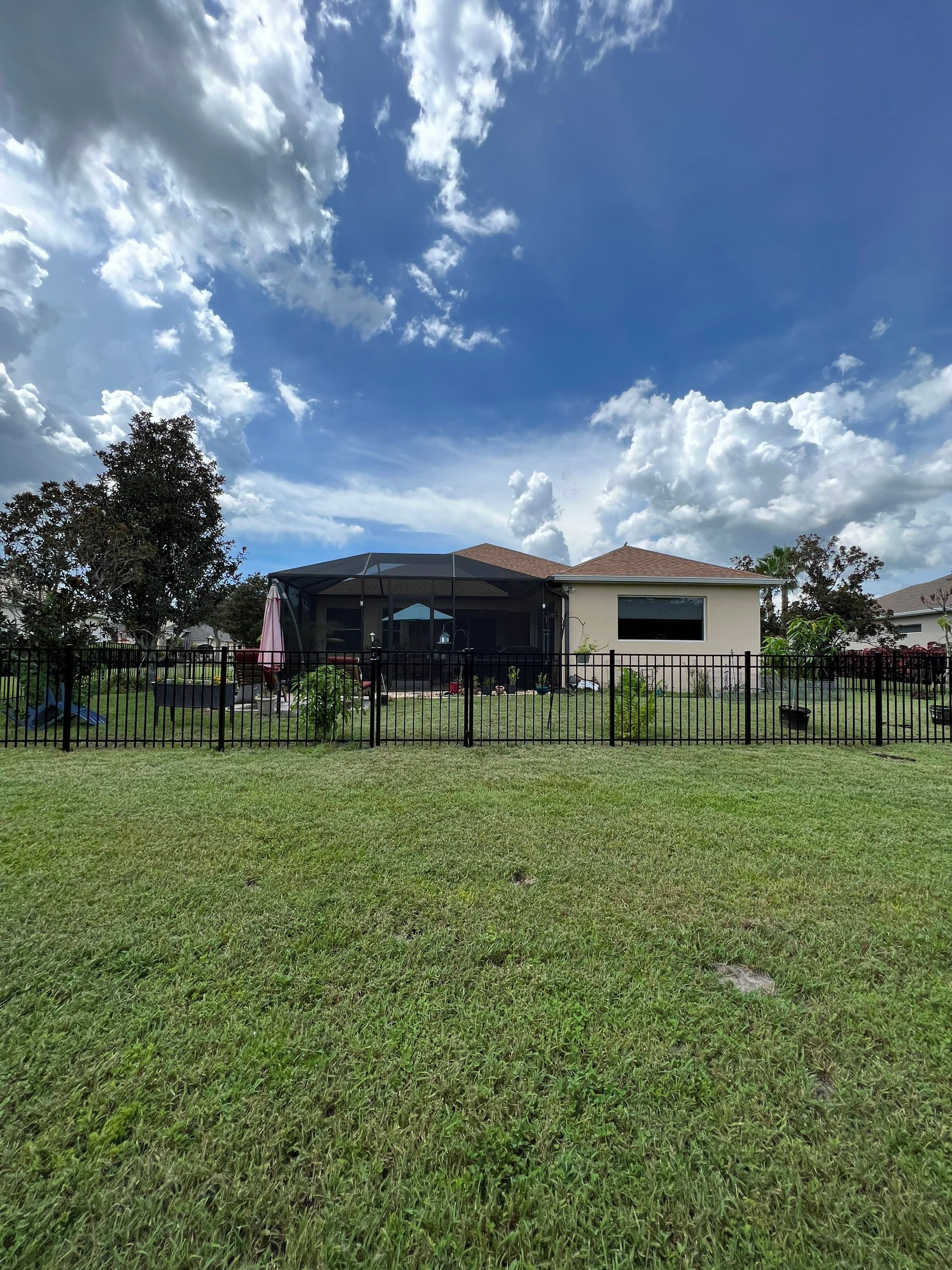 Black Aluminum Fence Installation in Bradenton, FL by Asap fence and gates, LLC